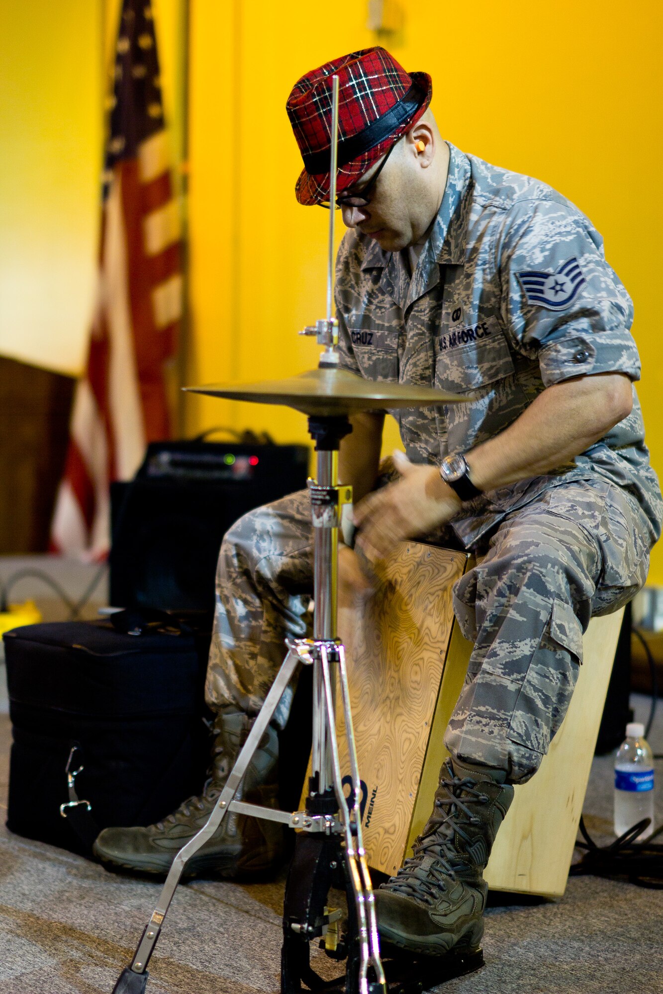 YIGO VILLAGE, Guam -- Staff Sgt. Freddie Cruz, Band of the Pacific-Asia percussioinist, solos for students at the Machanano Elementary School, Yigo Village, Guam, Dec. 13, 2011. Cruz received compliments on his playing following the show. (U.S. Air Force photo/Staff Sgt. Josh Voyles)