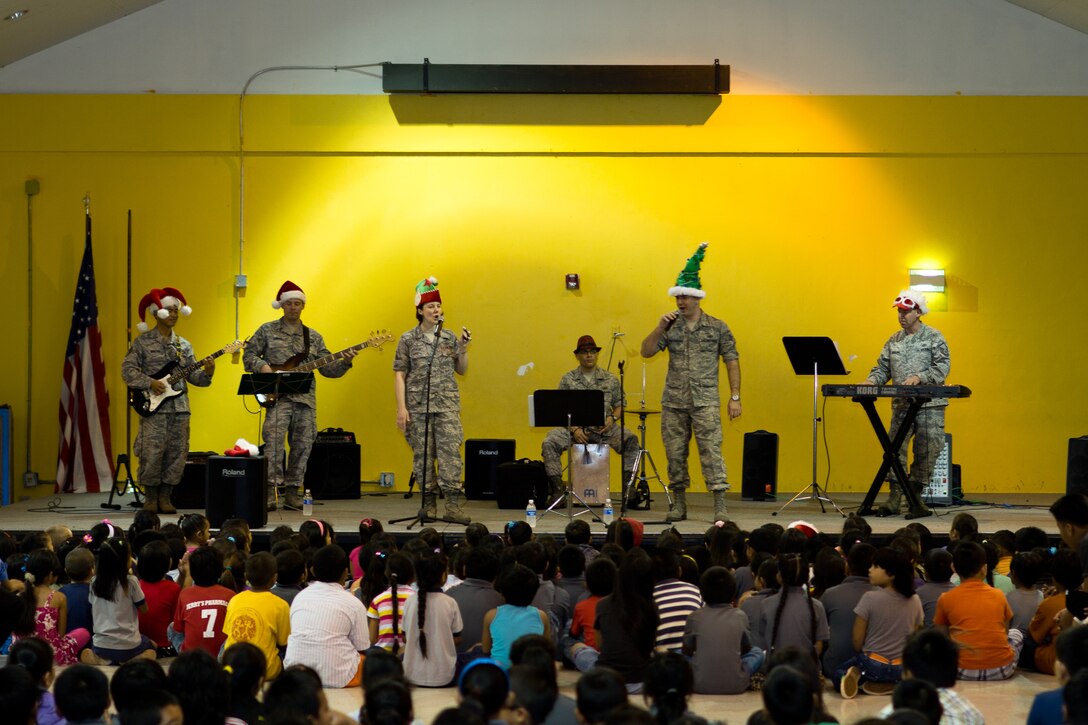 YIGO VILLAGE, Guam -- Band of the Pacific-Asia ensemble, Pacific Trends, performs for more than 500 students at the Machanano Elementary School, Yigo Village, Guam, Dec. 13, 2011. This was the first time a military band has played at the school. (U.S. Air Force photo/Staff Sgt. Josh Voyles)