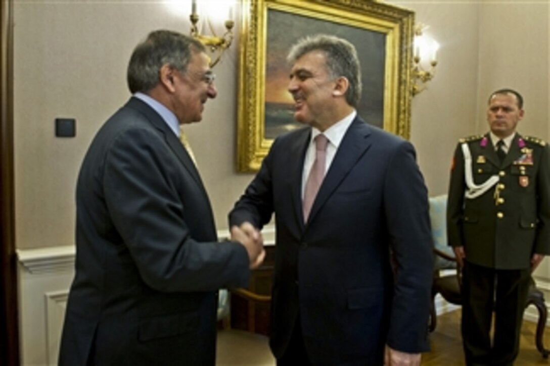 Secretary of Defense Leon E. Panetta shakes hands with Turkish President Abdullah Gul in Ankara, Turkey, on Dec. 16, 2011.  