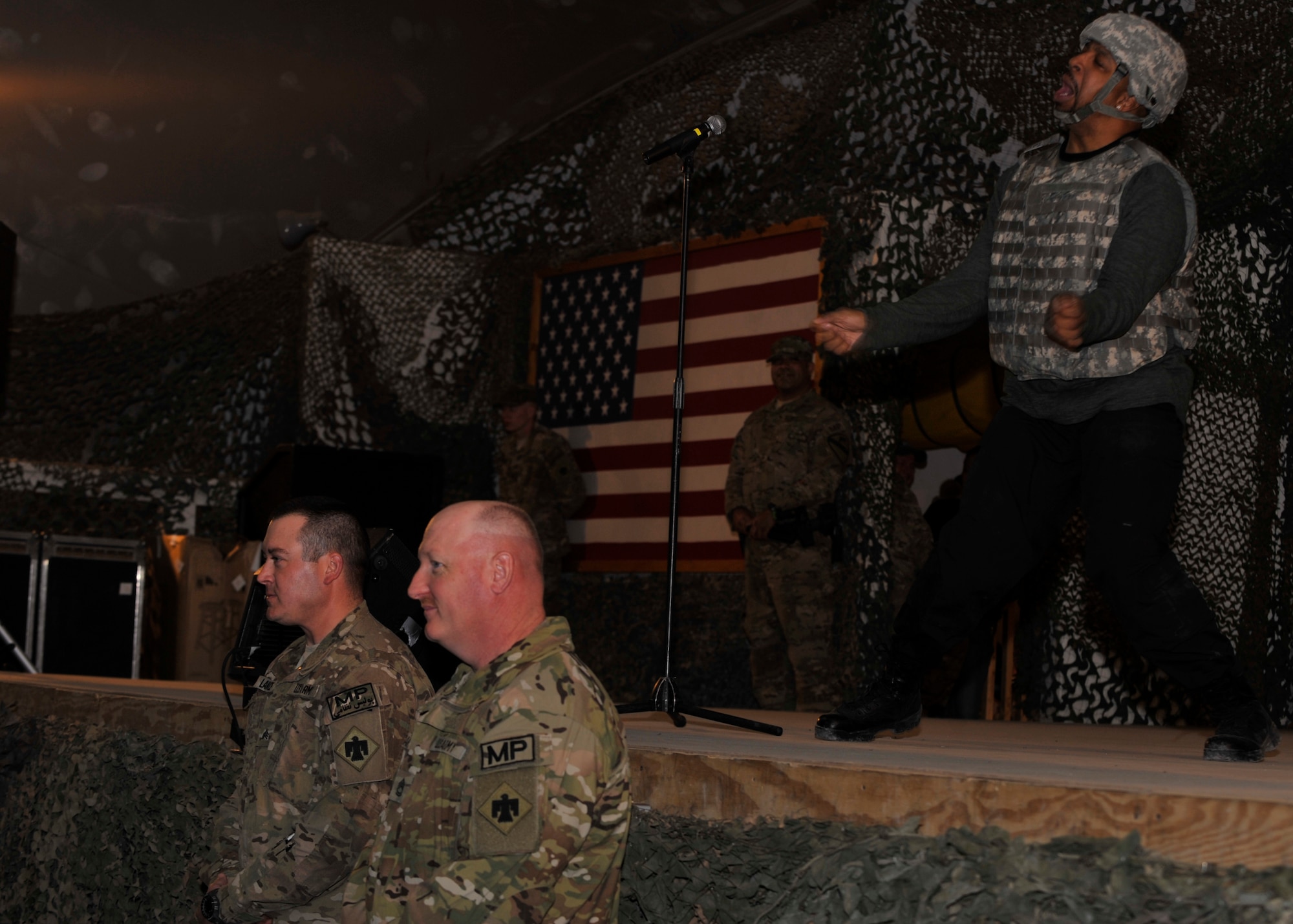 BAGRAM AIRFIELD, Afghanistan— Nephew Tommy performs at the Morale, Welfare and Recreation clamshell at Bagram Airfield, Afghanistan, Dec. 16, 2011. Tommy participated as a part of the United Services Organization Holiday Tour, a program that brings free shows to deployed troops in the hopes of raising morale. (U.S. Air Force photo/Airman 1st Class Ericka Engblom)