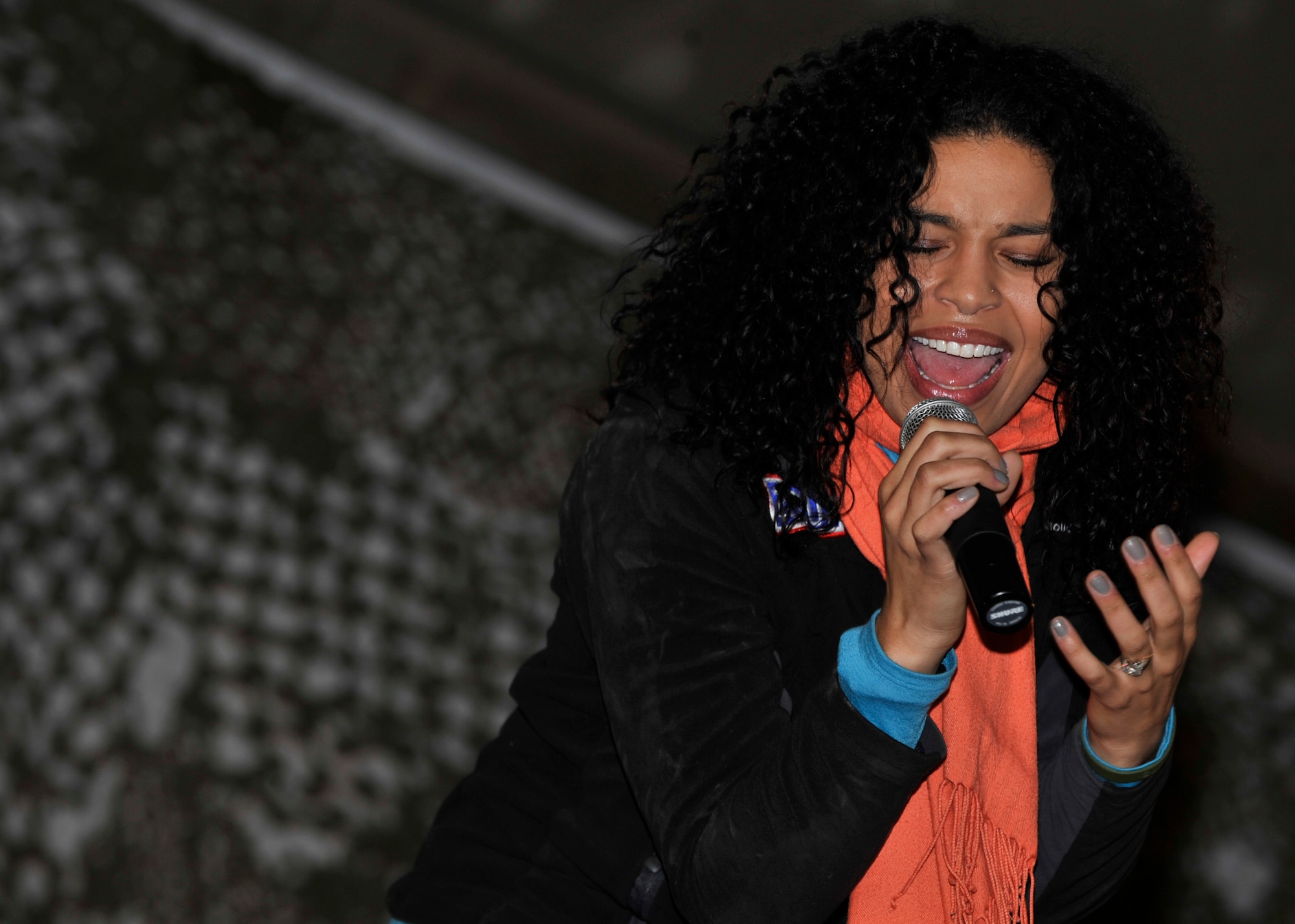 BAGRAM AIRFIELD, Afghanistan— Singer Jordan Sparks performs her single, “Tattoo,” at the Morale, Welfare and Recreation clamshell at Bagram Airfield, Afghanistan, Dec. 16, 2011. Sparks was the main performer at the United Services Organization Holiday Tour, a program designed to raise the morale of deployed troops. (U.S. Air Force photo/Airman 1st Class Ericka Engblom) 
