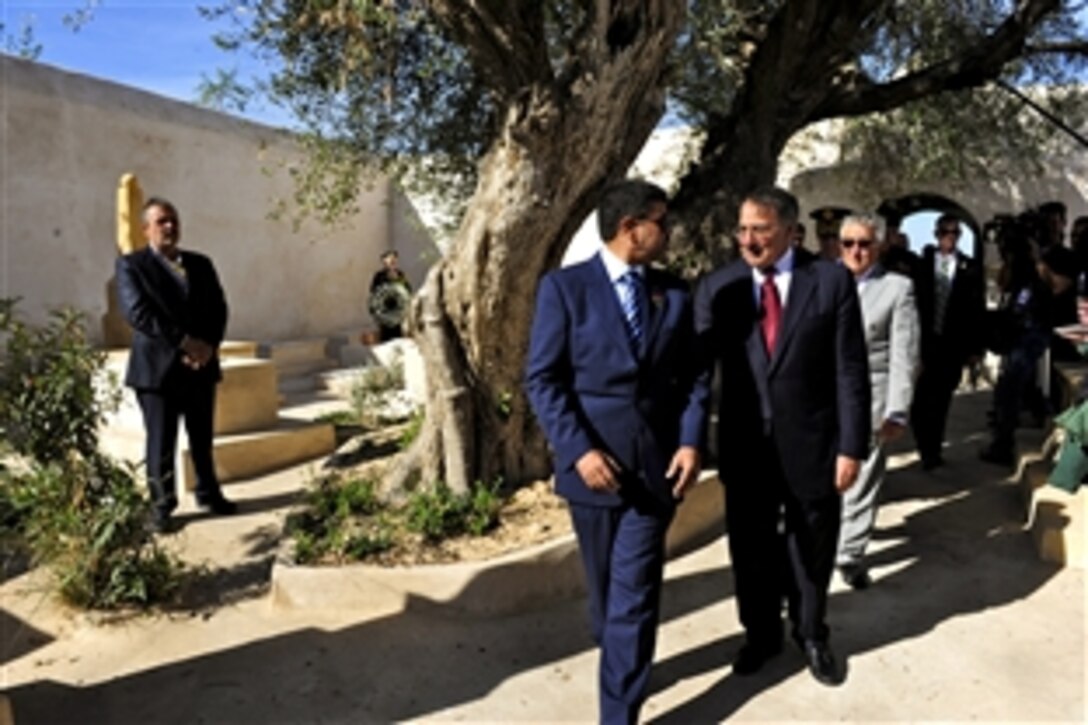 U.S. Defense Secretary Leon E. Panetta tours a cemetery on the shores of Tripoli, Libya, where U.S.  Marines and sailors lost aboard the USS Intrepid more than 200 years ago are buried, Dec. 17, 2011. Panetta is the first U.S. defense secretary to visit Libya. 