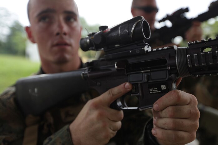 A mortarman with Battalion Landing Team 3/1 conducts weapons reloading drills here Dec. 17 during basic combat marksmanship training. The Camp Pendleton, Calif., based unit deployed from San Diego Nov. 14 aboard USS Makin Island, USS New Orleans and USS Pearl Harbor and arrived in Singapore Dec. 12 as part of a regularly scheduled deployment to the Western Pacific and Middle East regions.