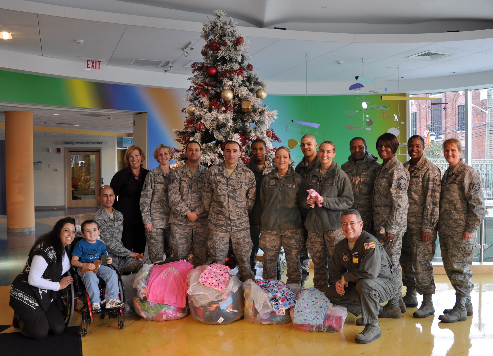 JOINT BASE MCGUIRE-DIX-LAKEHURST, N.J - Airmen from the 514th Air Mobility Wing, here, deliver pajamas and sweat pants to the Children's Specialized Hospital in New Brunswick, N.J., as part of the unit's community outreach program. The donation will be used to cloth young patients who do not have an extra change of clothes. (U.S Air Force photo/Master Sgt. Donna T. Jeffries) 