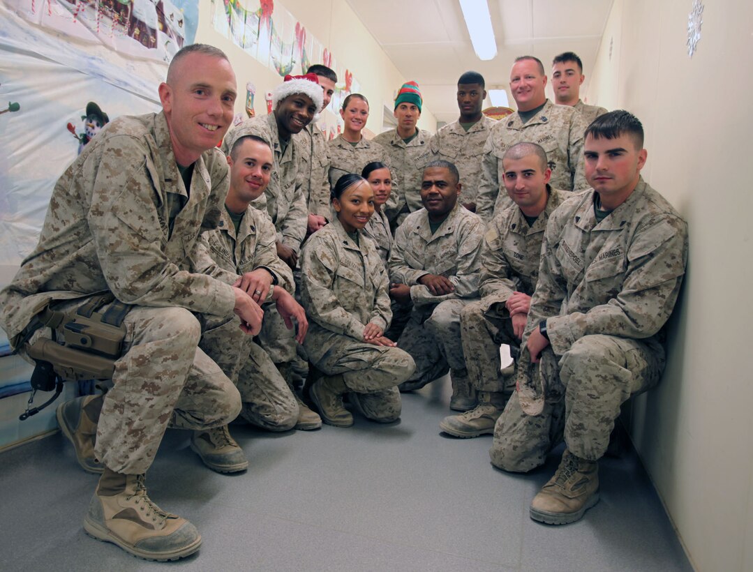 Marines in the G-1 Administration and Manpower section wish all their friends and family a Merry Christmas and Happy Holidays this season.  (Official U.S. Marine Corps photo by Cpl. Thomas Bellegarde)