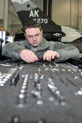 U.S. Air Force Tech. Sgt. Sterling Rosenau inspects tools for damage Dec. 19, 2011, Eielson Air Force Base, Alaska. The inspection is part of a routine 90-day check to make sure all tools are accounted for and functional. Rosenau is the support section chief assigned to the 354th Aircraft Maintenance Squadron. (U.S. Air Force photo by Staff Sgt. Christopher Boitz/Released)