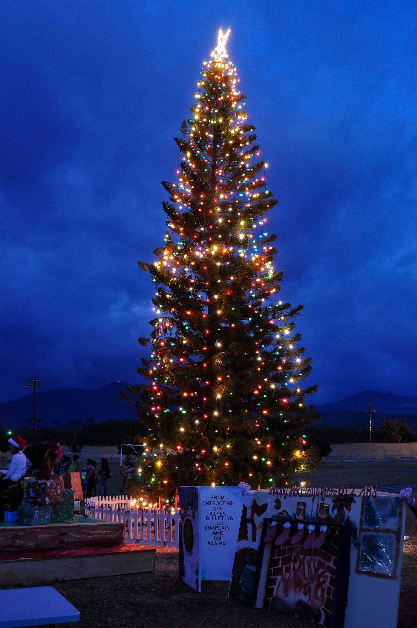 The Christmas Tree Lighting ceremony was one of the highlights of Team Soto Cano’s first Holiday Extravaganza Dec. 15 Soto Cano AB, Honduras. Other festivities included singing, dancing, fireworks, food and a special visit from everyone’s favorite guy Santa Claus donning a red suit. (Air Force photo by Staff Sgt. Bryan Franks)