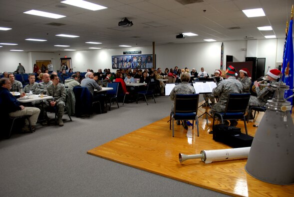 Employees at the Air Force Research Laboratory, Det. 7, pack the Rocket Science Center at AFRL to enjoy holiday tunes courtesy of the Golden West Winds, an ensemble from the Band of the Golden West out of Travis AFB, Calif. (U.S. Air Force photo by Melissa Buchanan)