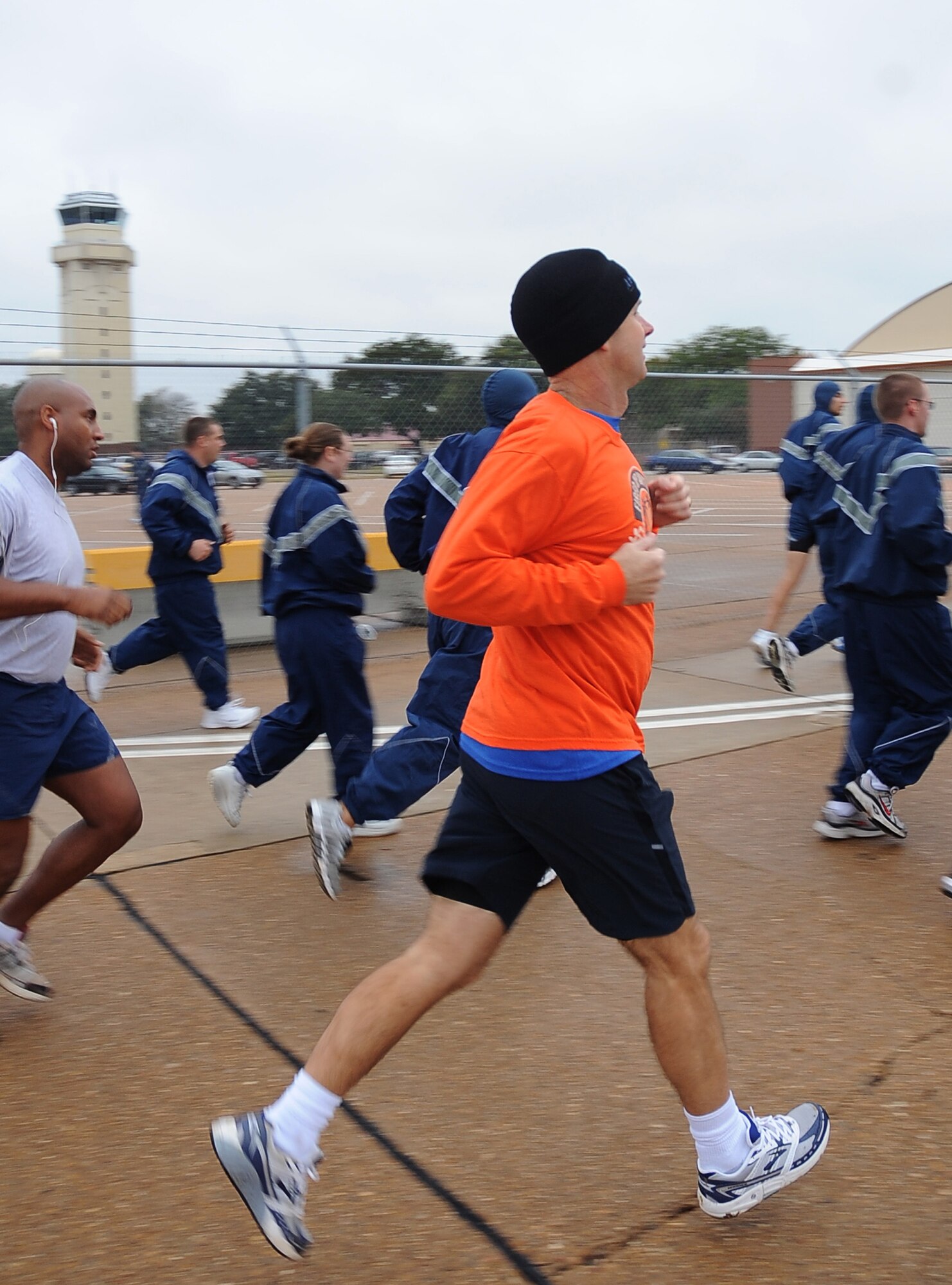 Members of Team Barksdale begin the Ham Haul Fun Run Dec. 16 at the flightline on Barksdale Air Force Base, La. More than 80 Airmen participated in the event, only the second time in several years a fun run was held on the base flightline. (U.S. Air Force photo/Senior Airman Amber Ashcraft)(RELEASED)