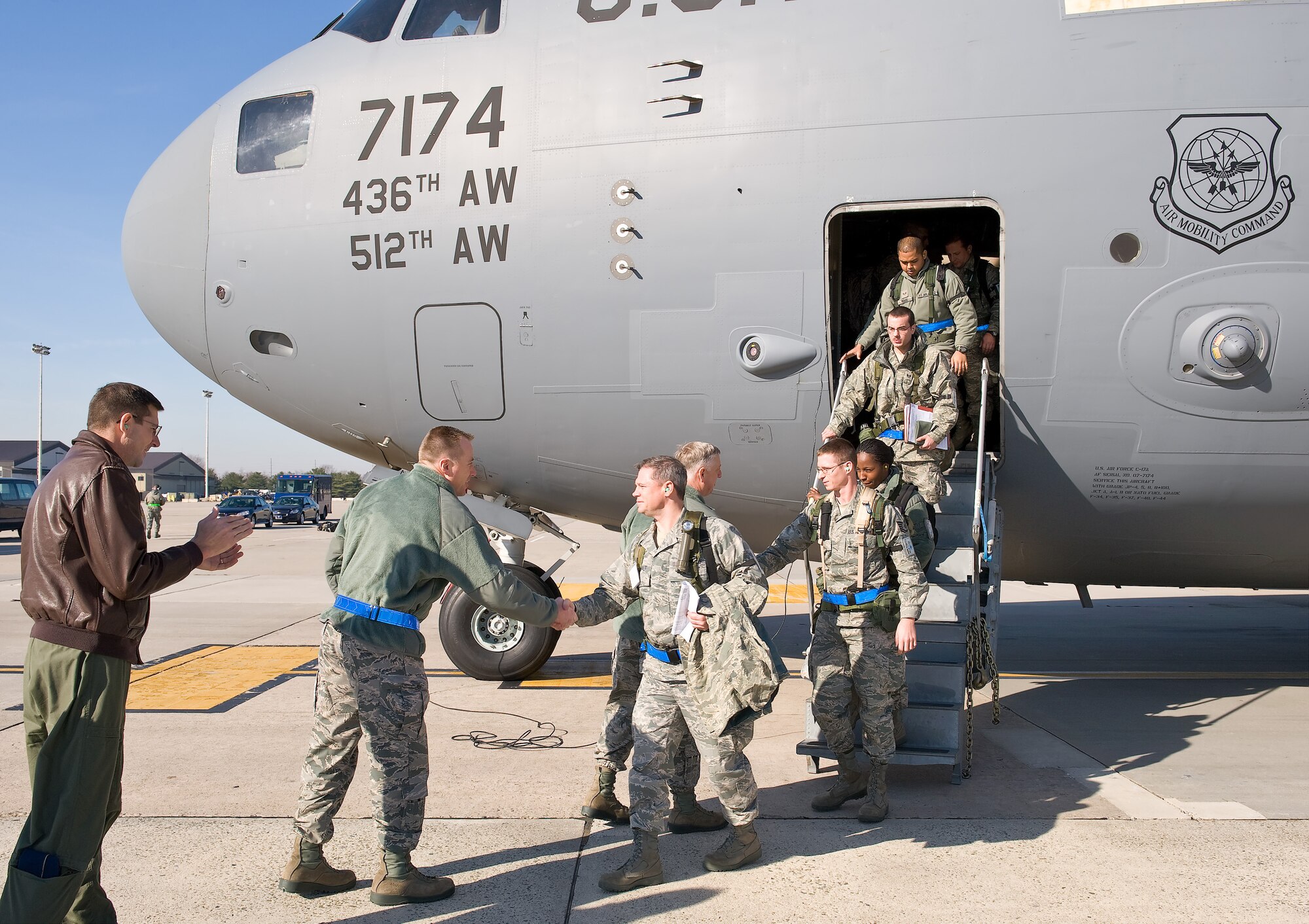 Base leadership welcomes back 436th and 512th Airlift Wing personnel from the Operational Readiness Inspection Dec. 13, 2011, at Dover Air Force Base, Del.  (U.S. Air Force photo/Roland Balik)