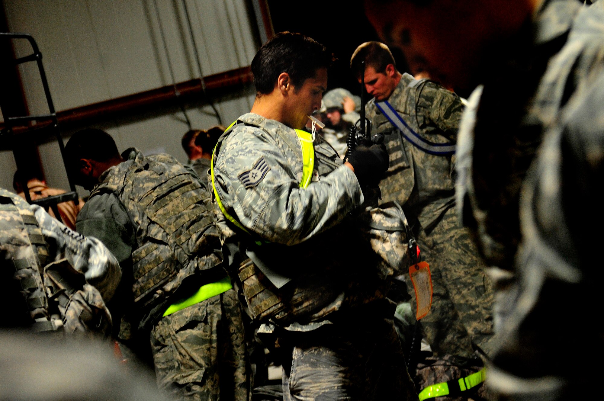 Staff Sgt. Aviam Krupnick prepares to turn in his weapon Dec. 18, 2011, at an undisclosed location in Southwest Asia. Krupnick and the Airmen accompanying him are the last service members to redeploy from Iraq. Krupnick is an aerial porter assigned to the 407th Air Expeditionary Group. (U.S. Air Force photo/Master Sgt. Cecilio Ricardo)