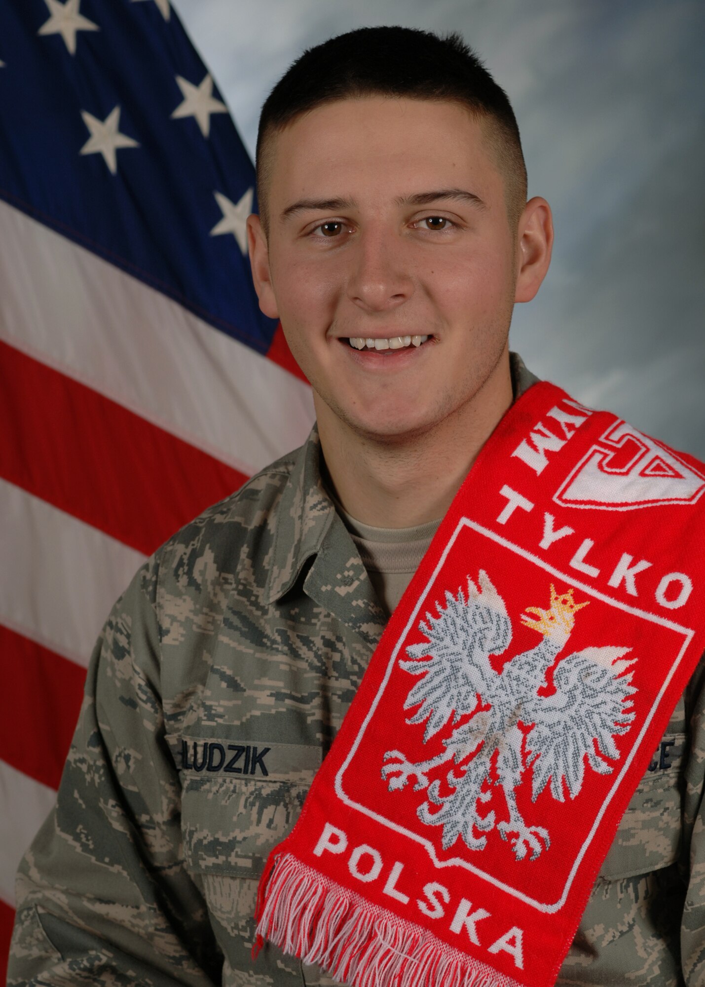 Airman Dawid Mludzik, 319th Civil Engineering Squadron, poses for a photo Dec. 14 on Grand Forks Air Force Base, N.D. (U.S. Air Force photo/Airman 1st Class Derek VanHorn)