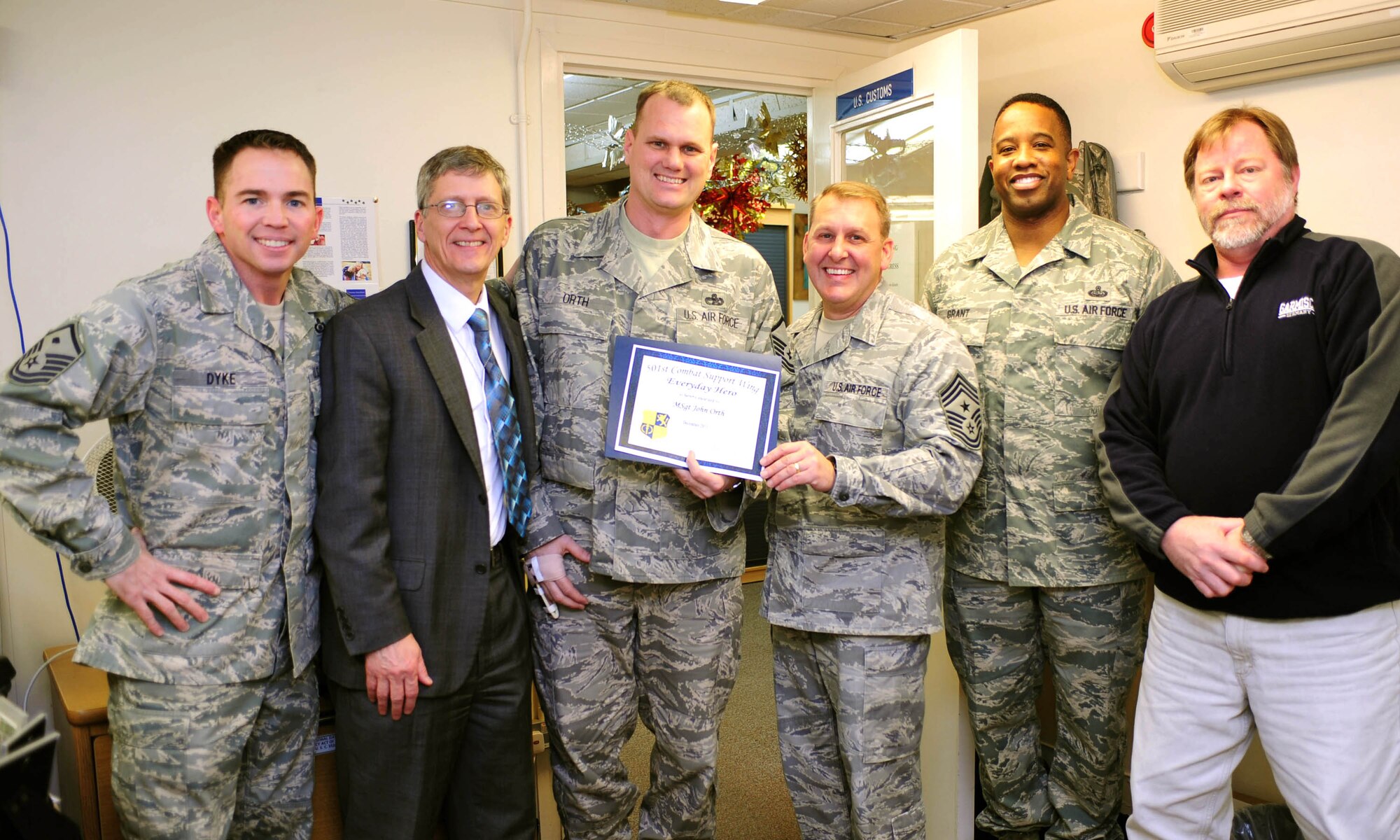 RAF MENWITH HILL, United Kingdom - Master Sgt. John Orth, 421st Air Base Squadron, was named the December 501st Everyday Hero from the 421st Air Base Group. Orth leads a six-person personal property and customs office, which supports more than 3,800 people in the RAF Menwith Hill community. (U.S. Air Force photo by Staff Sgt. Ave Young)

