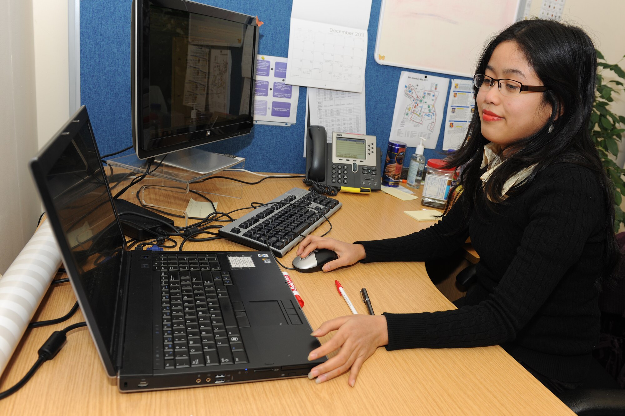 RAF ALCONBURY, United Kingdom - Mia Foster, 501st Combat Support Wing, was named the December 501st Everyday Hero from the 501st CSW Staff. Foster is a volunteer for the 501st CSW Protocol Office. She has supported multiple distinguished visitor visits and has helped in the success of events over the past six months. (U.S. Air Force photo by Senior Airman Joel Mease)
