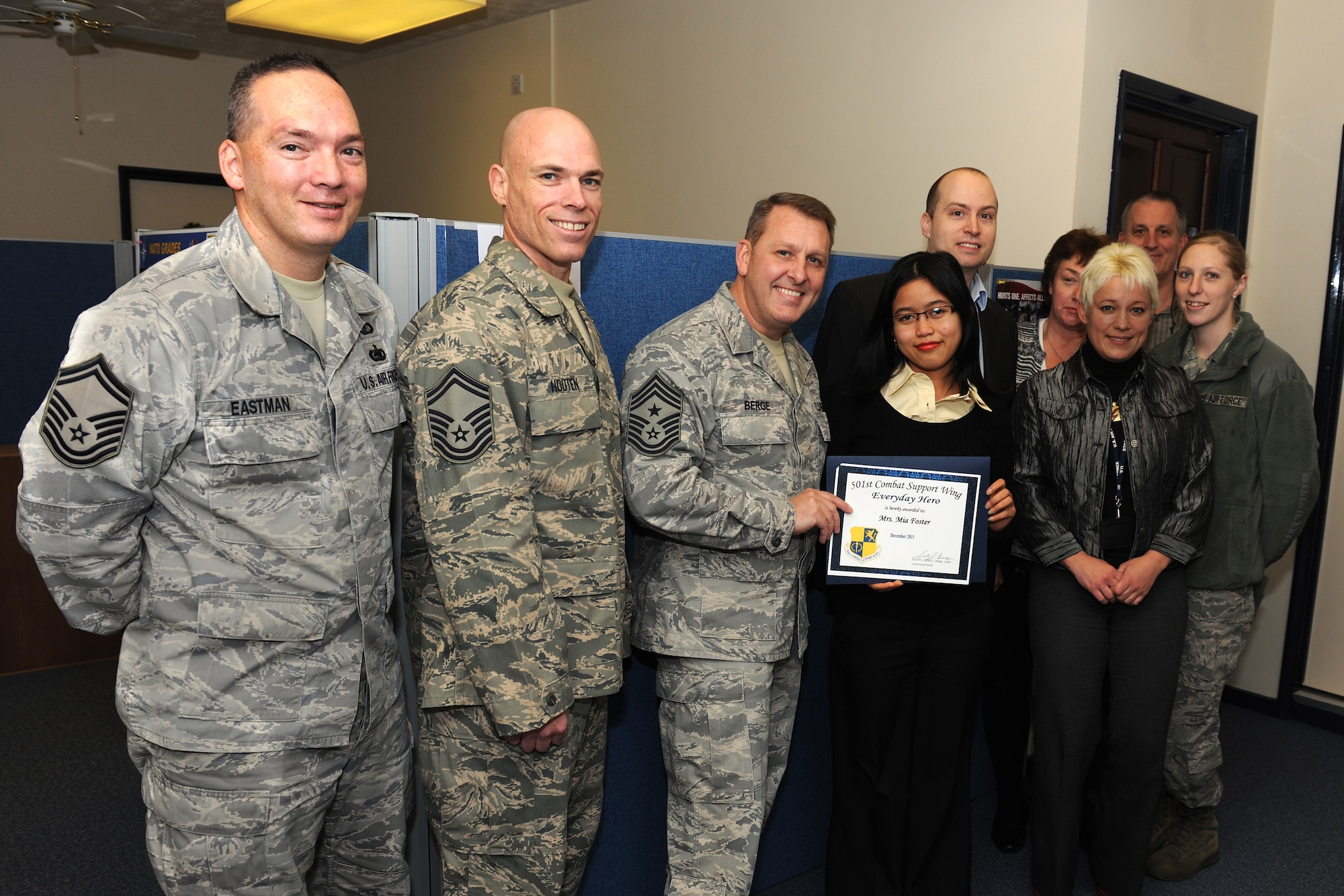 RAF ALCONBURY, United Kingdom - Mia Foster, 501st Combat Support Wing, was named the December 501st Everyday Hero from the 501st CSW Staff. Foster is a volunteer for the 501st CSW Protocol Office. She has supported multiple distinguished visitor visits and has helped in the success of events over the past six months. (U.S. Air Force photo by Senior Airman Joel Mease)
