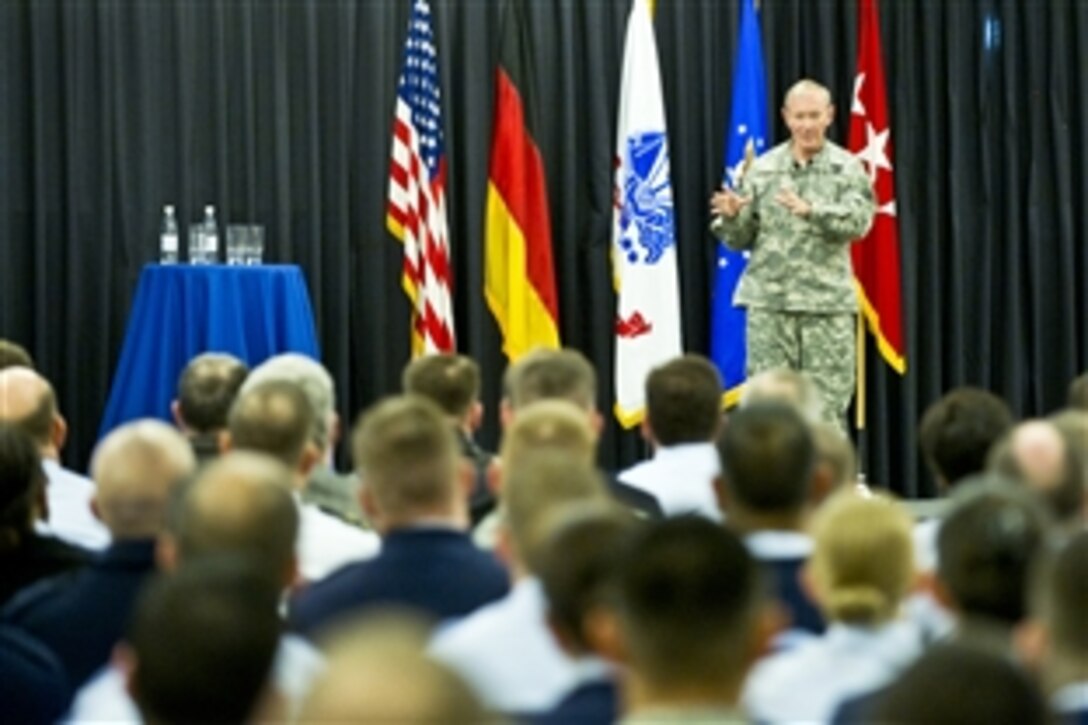 U.S. Army Gen. Martin E. Dempsey, chairman of the Joint Chiefs of Staff, conducts a town hall on Ramstein Air Base, Germany, Dec. 19,  2011