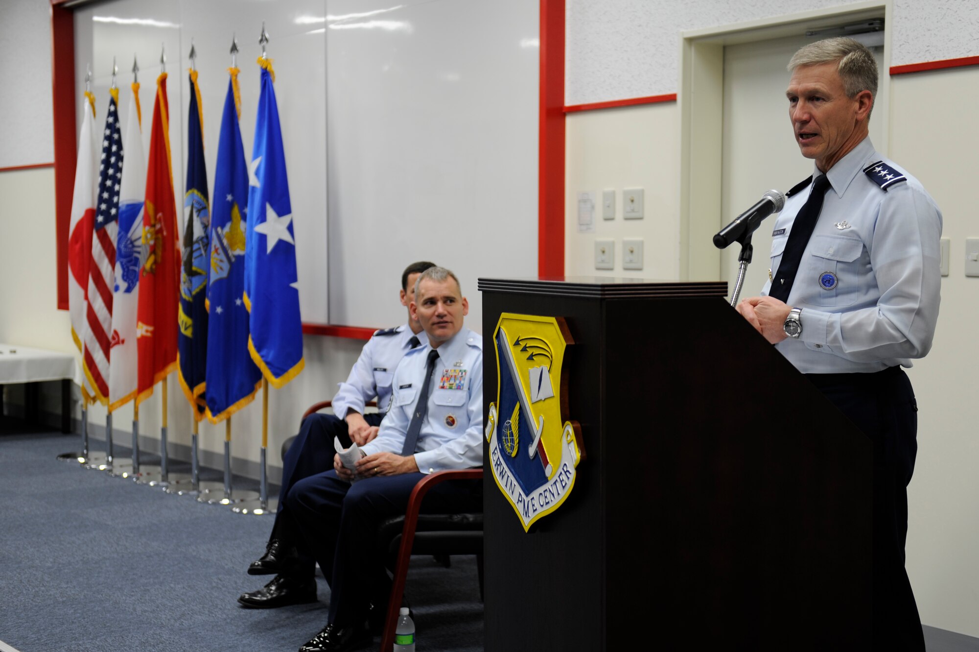 U.S. Air Force Lt. Gen. Jeff Remington, 7th Air Force commander and former 18th Wing commander, gives a speech during the rededication of the Erwin Professional Military Education Center on Kadena Air Base, Japan, Dec. 16, 2011. Remington, a brigadier general at the time, initiated the construction project planning while stationed on Kadena from 2002-2004. (U.S. Air Force photo by Airman 1st Class Maeson L. Elleman/Released)