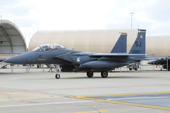 An F-15E Strike Eagle taxis to its designated parking spot on Seymour Johnson Air Force Base, N.C., Dec. 20, 2011 from a deployment to Bagram Airfield, Afghanistan. More than 100 Airmen from various career fields are slated to return in the next few days from their deployment in support of Operation Enduring Freedom. (U.S. Air Force photo by Senior Airman Rae Perry)