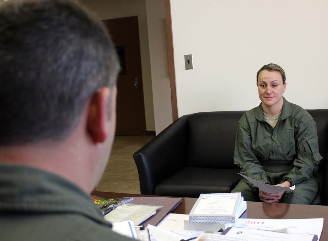 Master Sgt. Karrie Warren, assistant superintendent of the 601st Air and Space Operations Center’s Combat Operations Division, receives a flight brief from Lt. Col. Greg Blount, a standards and evaluation pilot from the 53rd Weapons Evaluation Group, at Tyndall Air Force Base, Fla., Dec. 15. Warren, who was the 601st AOC’s Senior Noncommissioned Officer of the Year, received an incentive flight in an F-4 as part of a new initiative designed to provide more rewards to the command’s top enlisted performers. (U.S. Air Force photo by Angela Pope)