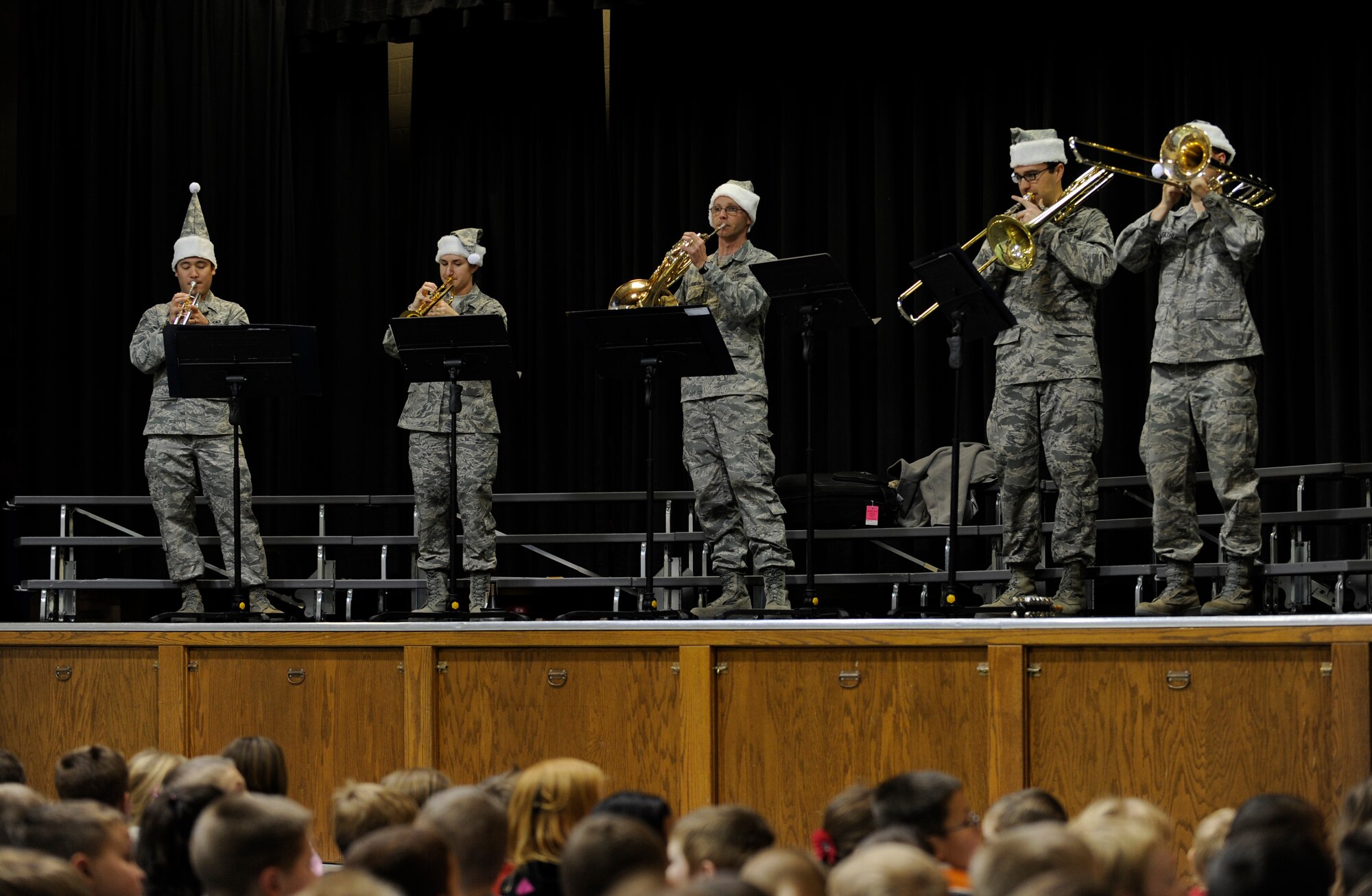 MINOT AIR FORCE BASE, N.D. – The U.S. Air Force Heartland of America Band performs an assortment of Christmas music for students at the Dakota Elementary School here Dec. 14. The band toured Minot AFB for three days, performing at various locations, spreading good cheers and improving morale. (U.S. Air Force photo/Airman 1st Class Stephanie Ashley)