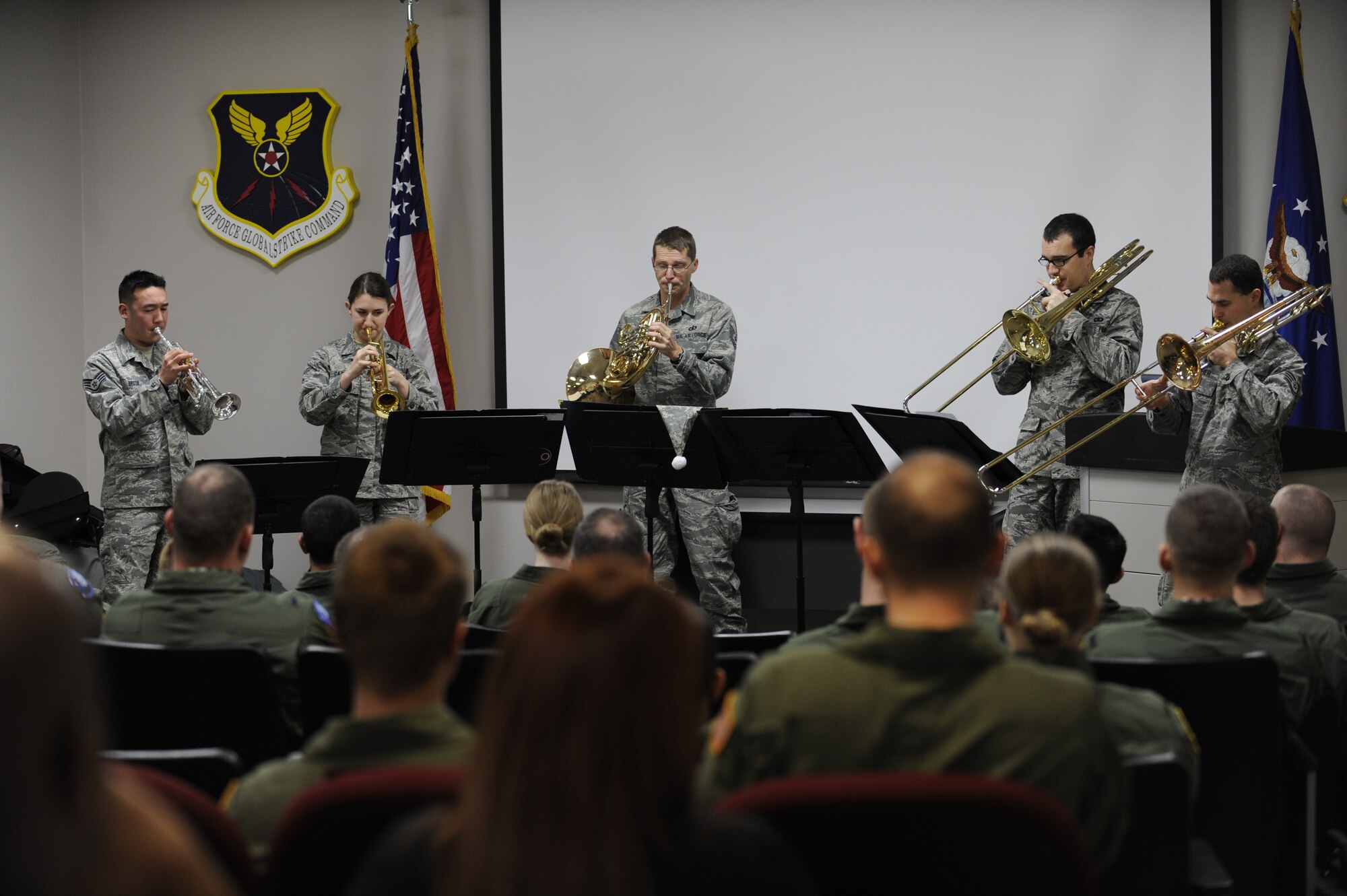 MINOT AIR FORCE BASE, N.D. -- The U.S. Air Force Heartland of America Band performs for 91st Missile Wing personnel at the wing headquarters building here Dec. 16. The band toured Minot AFB for three days, performing at various locations, spreading good cheers and improving morale. (U.S. Air Force photo/Airman 1st Class Stephanie Ashley)