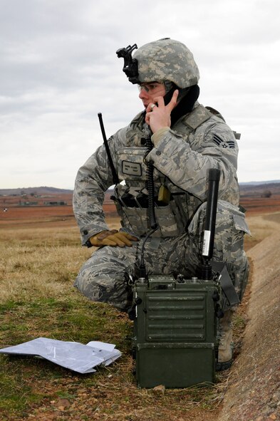 Senior Airman Daniel Clark, a Joint Terminal Attack Controller (JTAC), plots coordinates for A-10C Thunderbolt II “Warthog” air strikes during a Close-Air Support (CAS) training exercise at the 188th Fighter Wing’s Detachment 1 Razorback Range, which is located on Fort Chaffee Maneuver Training Center, Ark. Clark is a member of the 19th Air Support Operations Squadron based in Fort Campbell, Ky. The 188th’s Razorback Range is a key asset and currently is the best among all Air National Guard units nationwide in terms of proximity to the wing. Razorback Range’s proximity to Ebbing Air National Guard Base allows the 188th’s A-10s to be on the range just two minutes after takeoff, which makes the unit the most efficient A-10 unit in the ANG in terms of training costs. (U.S. Air Force photo by Capt. Heath Allen/188th Fighter Wing Public Affairs)