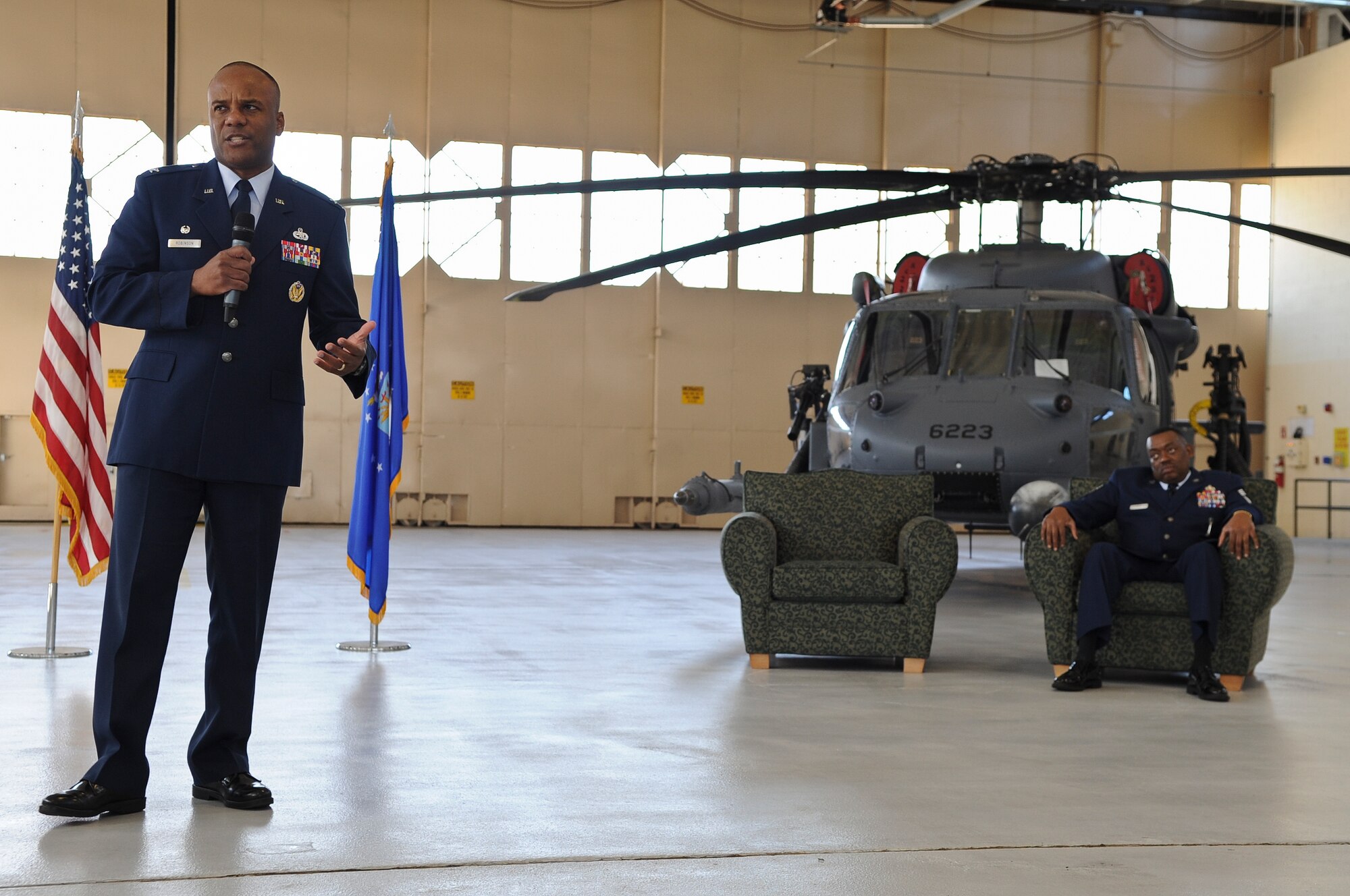 U.S. Air Force Col. Neal Robinson, 23rd Maintenance Group commander, gives opening remarks during a retirement ceremony held for Chief Master Sgt. Kenneth Lilly, 23rd Wing weapons manager at Moody Air Force Base, Ga., Dec. 19, 2011. Lilly is scheduled to retire March 1st from active duty. (U.S. Air Force photo by Airman 1st Class Olivia Dominique/Released)