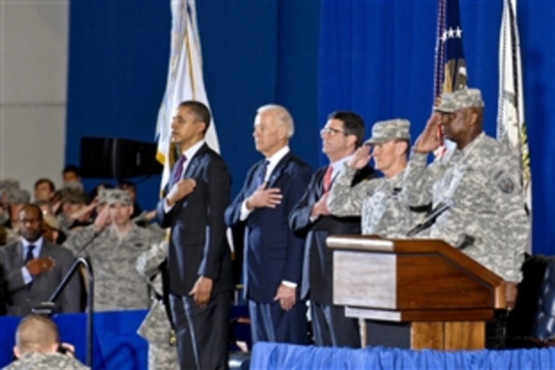 From left, President Barack Obama, Vice President Joe Biden, Deputy Defense Secretary Ashton B. Carter, Army Gen. Martin E. Dempsey, chairman of the Joint Chiefs of Staff, and Army Gen. Lloyd J. Austin III, the last commander of U.S. Forces Iraq, salute during a ceremony to retire colors from the U.S. Iraq mission on Joint Base Andrews, Md., Dec. 20, 2011.