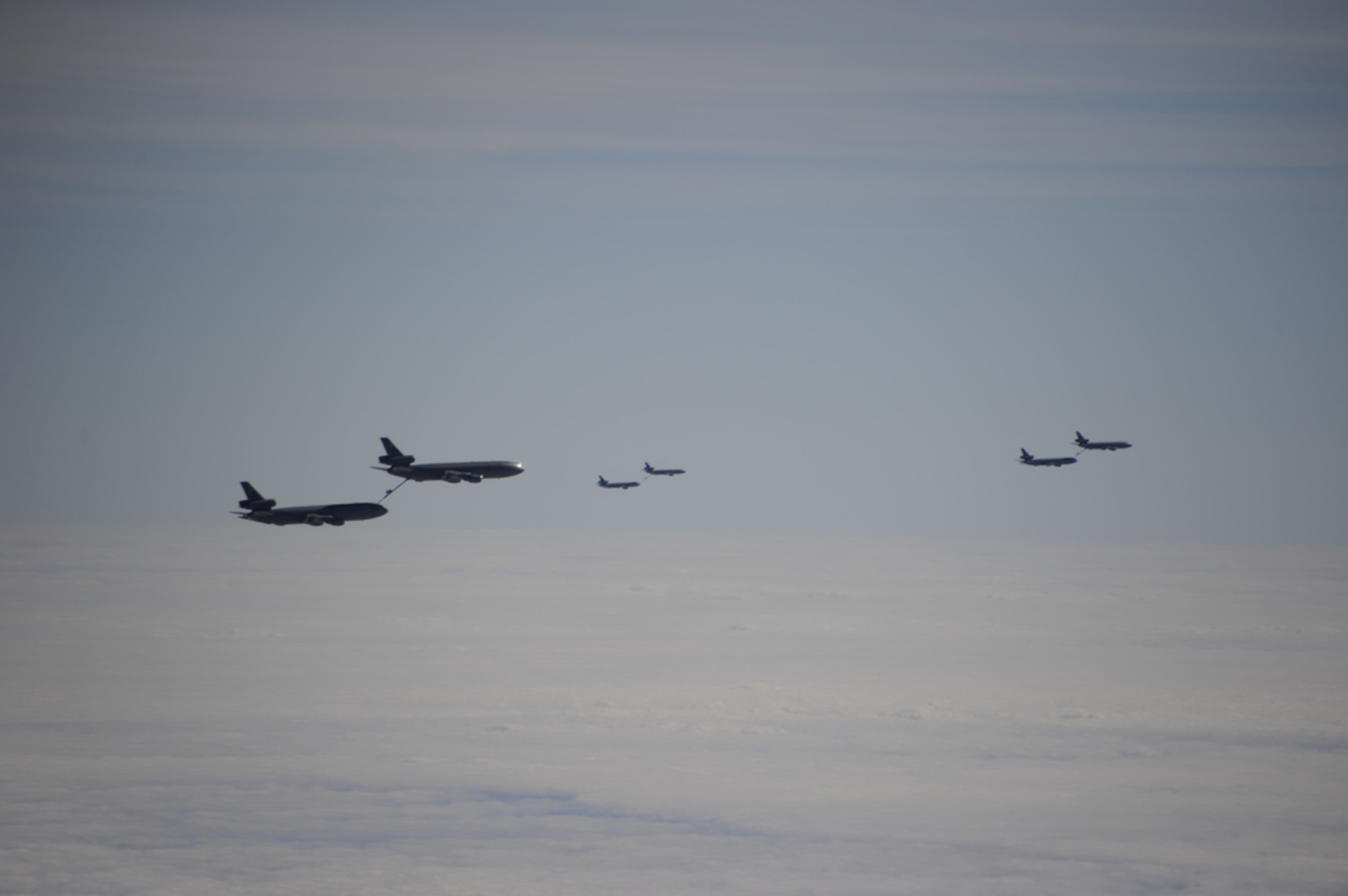 Three sets of two KC-10 Extenders perform aerial refueling simultaneously during an ‘Elephant Walk’ exercise Dec. 20 here. Members of the 32nd and 2nd Air Refueling Squadrons, as well as members of the 305th and 514th Air Mobility Wings, participated in the Employment Defense and Global Engagement exercise, which included mass simultaneous aerial refueling of four KC-10s by four other KC-10s. This was the first ‘Elephant Walk’ exercise at Joint Base McGuire-Dix-Lakehurst in over five years. (U.S. Air Force photo by 2nd Lt. David J. Murphy/Released)