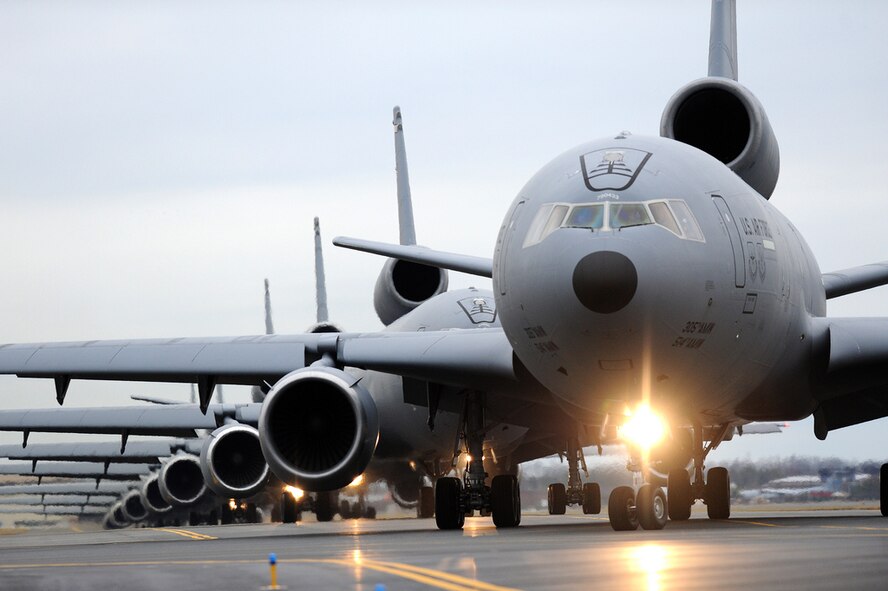 The lumbering formation of KC-10s taxing out is affectionately known to aircrew and maintainers as an “Elephant Walk.”  'Elephant Walk' is a unique Air Force term introduced during World War II, eventually becoming a part of the Air Force's institutional language. The Army Air Corps' large fleet of bombers would regularly conduct attacks by sorties comprising more than 1,000 aircraft. Observers commented that the nose-to-tail, single-file taxi movements of the heavily-laden bombers paralleled the nose-to-tail trail of lumbering elephants on their way to the next watering hole. The term stuck and the Elephant Walk remained commonplace through the Cold War when large formations of tankers and bombers would execute taxi drills routinely. (U.S. Air Force photo by Russell Meseroll/Released)