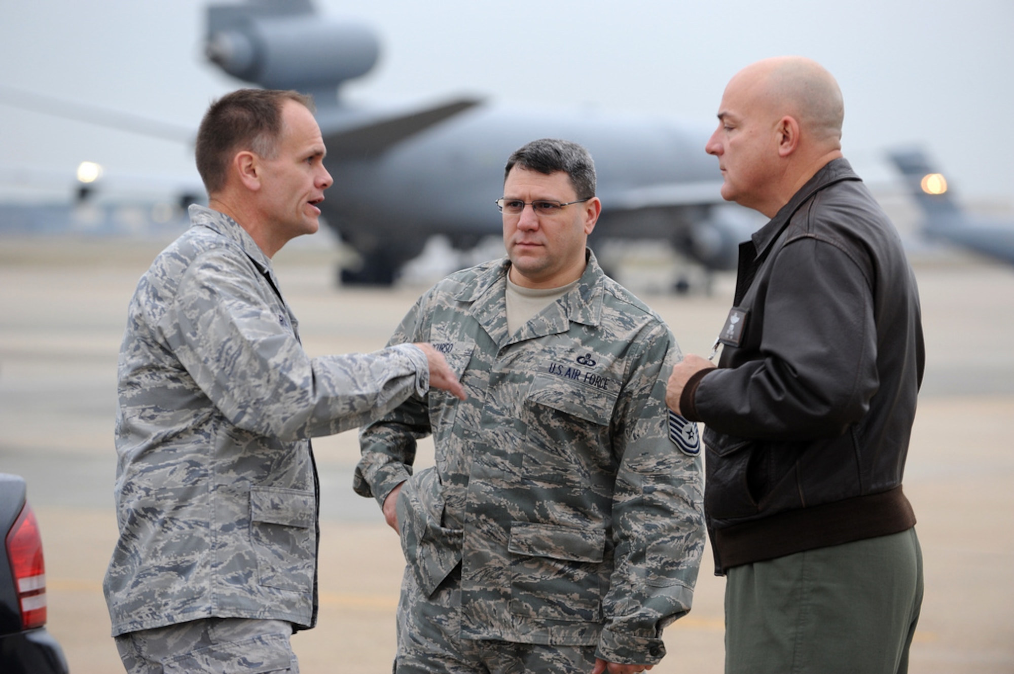Col. John Roscoe, 305th OG commander originally from Centralia, Pa., speaks with Lt. Col. Jimmy Shaw, 305th Operations Group deputy commander originally from Tucson, Ariz., and Chief Master Sgt. Samuel D’urso, 305th OG superintendent originally from Philadelphia, Pa., about the ‘Elephant Walk’ exercise shortly before it kicked off Dec. 20 here. An ‘Elephant Walk’ is a fundamental training element when preparing for Global Strike Missions. In all, the exercise involved 12 KC-10s as part of a global-strike package designed to demonstrate the capability of the Air Force to assemble a large refueling force. Members of the 32nd and 2nd Air Refueling Squadrons, as well as members of the 305th and 514th Air Mobility Wings, participated in the Employment Defense and Global Engagement exercise. (U.S. Air Force photo by Russell Meseroll/Released)