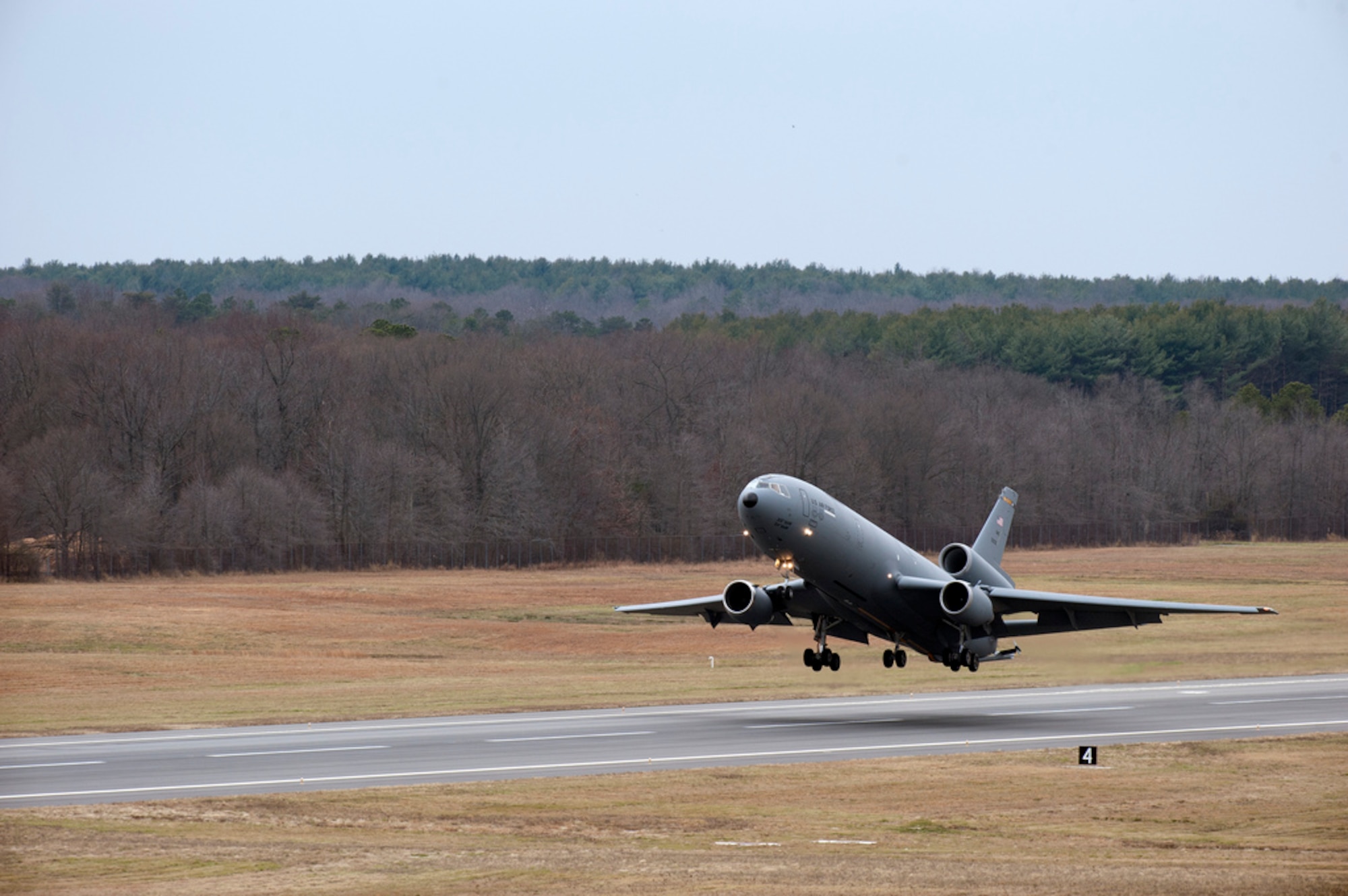 The first in the group of eight KC-10 Extenders takes off Dec. 20 here in support of the ‘Elephant Walk’ exercise. An ‘Elephant Walk’ is a fundamental training element when preparing for Global Strike Missions. In all, the exercise involved 12 KC-10s as part of a global strike package exercise designed to demonstrate the capability of the Air Force to assemble a large refueling force. (U.S Air Force photo by Wayne Russell/Released)