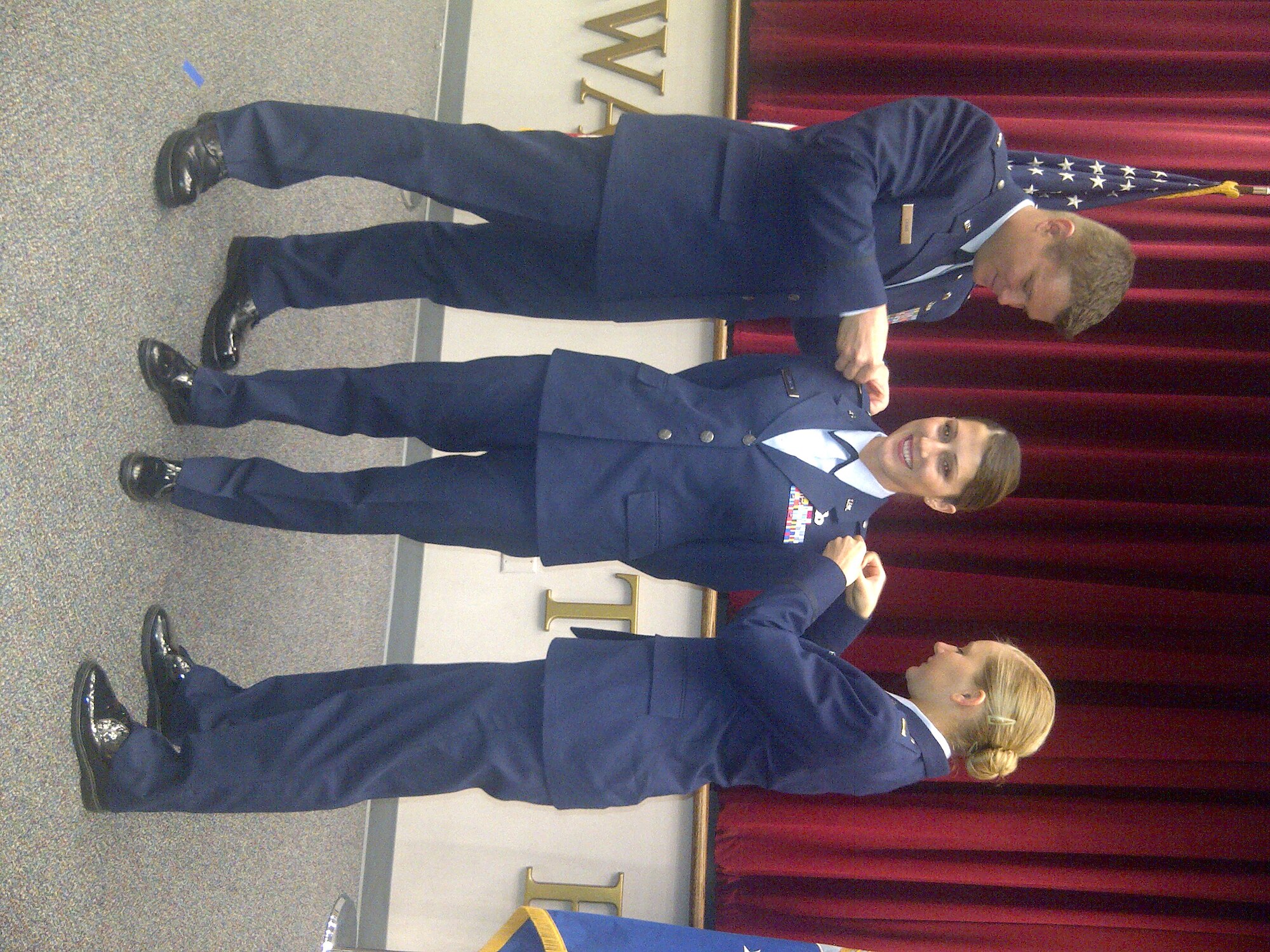 Second Lieutenant Bobbiejean Johnson beams as she receives her commission during completion of Officer Training School this month. Formerly the lieutenant served as an enlisted personnel specialist with the 507th Mission Support Group. This week she starts her new position serving as the 507th Maintenance Group Executive officer. Also pictured above is 2nd Lt. Brandon Craig and 2nd Lt. Jessica Rush pinning Johnson's rank on.