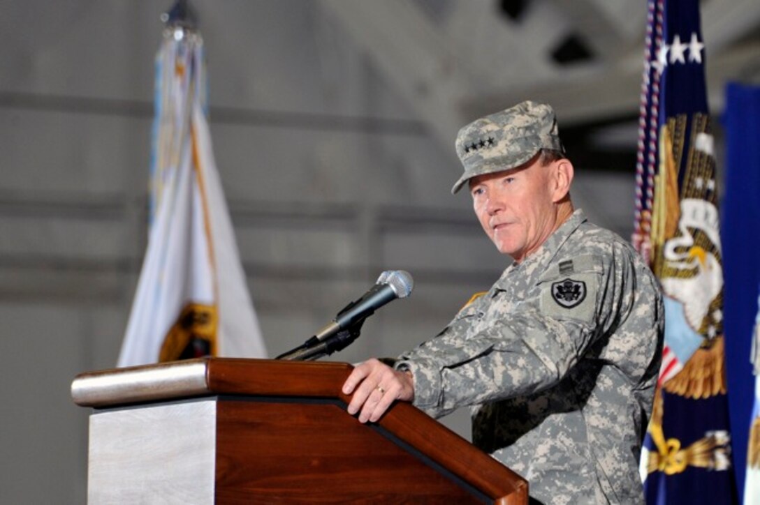 Gen. Martin Dempsey, Chairman of the Joint Chiefs of Staff  speaks during the return of the United States Forces - Iraq colors ceremony, Dec 20, 2011 at Joint Base Andrews, Md. The Ceremony marks the end of the 2nd longest war in U.S. History. (U.S. Air Force Photo/ Senior Airman Perry Aston) 
