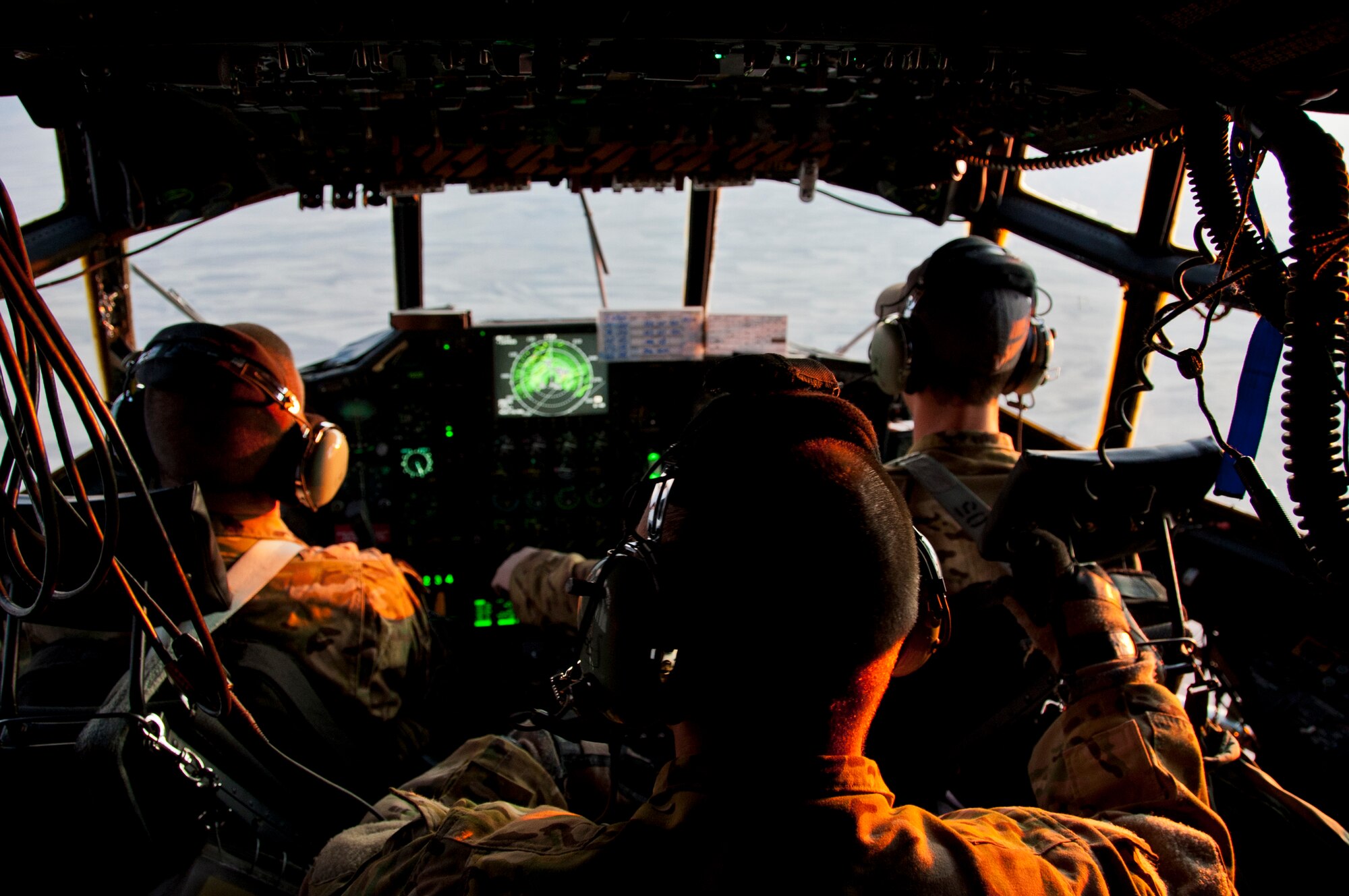 CAMP BASTION, Afghanistan -- Members of the 76th Expeditionary Rescue Squadron fly during a medical evacuation mission Dec. 14, 2011. Members of the 76th ERQS, nicknamed "Fever," fly into remote combat outposts, forward operating bases and camps to retrieve wounded personnel and trasnport them to more advanced medical treatment facilities like those at Bagram and Kandahar airfields. (U.S. Air Force photo by Staff Sgt. David Carbajal)