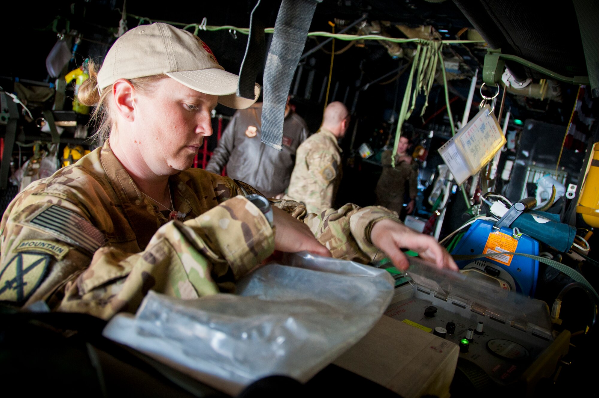 CAMP BASTION, Afghanistan -- Army Capt. Elizabeth Hultgren, 76th Expeditionary Rescue Squadron nurse, checks the medical equipment prior to a mission at Camp Bastion, Afghanistan, Dec. 14, 2011. Since June 2011, the 76th ERQS has flown more than 475 missions transporting nearly 600 patients out of remote areas of Afghanistan to more advanced medical treatment facilities. (U.S. Air Force photo by Staff Sgt. David Carbajal)