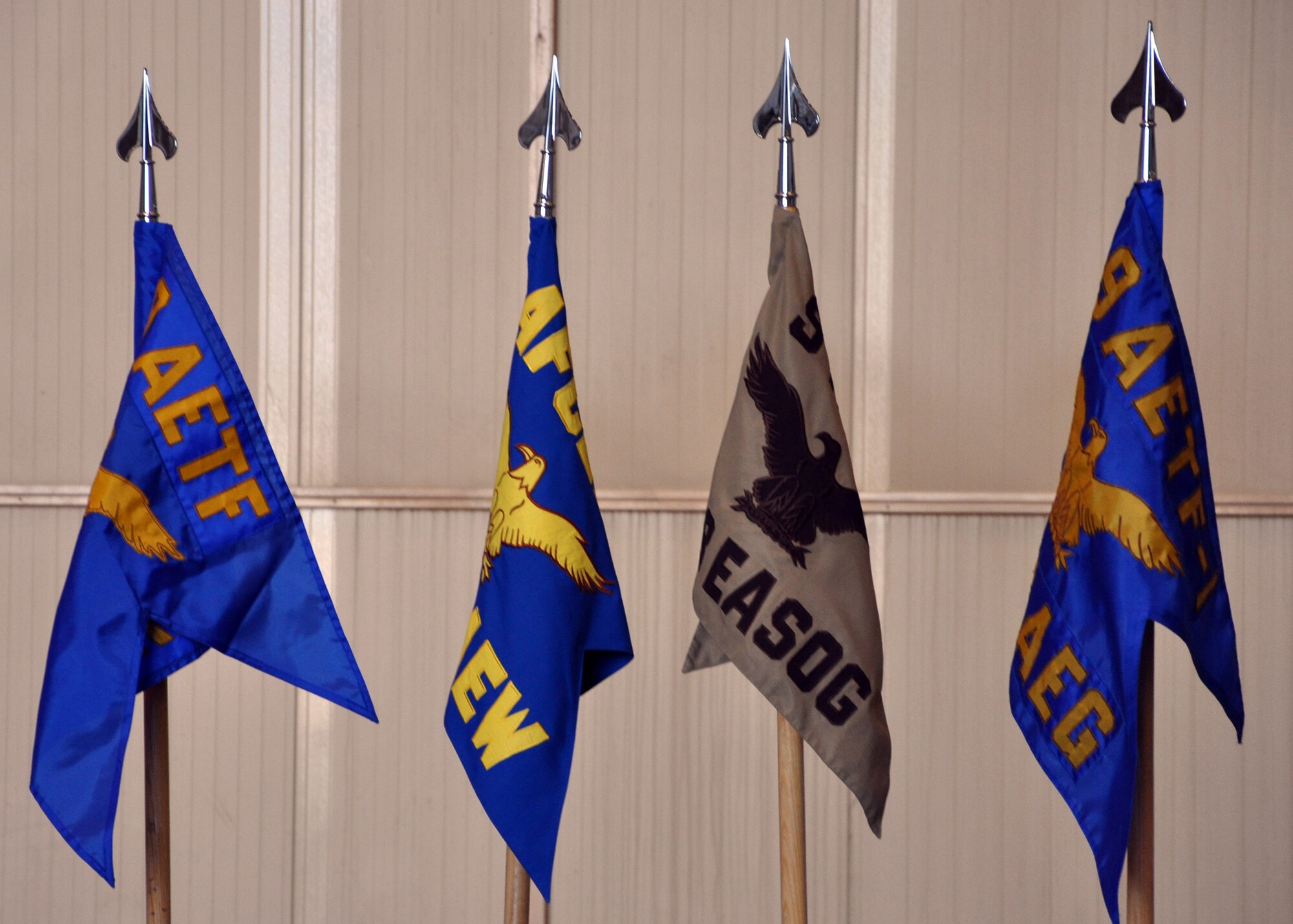 The four guideons representing the 467th Air Expeditionary Group,  368th Expeditionary Air Support Operations Group, 321st Air Expeditionary Wing and the 9th Air and Space Expeditionary Task Force-Iraq are ready for casing during the 9th AETF-I Inactivation Ceremony Dec. 18, 2011.The ceremony was held hours after the last U.S. military convoy departed Iraq, punctuating the end of a nearly nine-year war. It also afforded senior leaders an opportunity to reflect over the many accomplishments and sacrifices of service members. (U.S. Air Force photo/Tech. Sgt. Stacy Fowler)