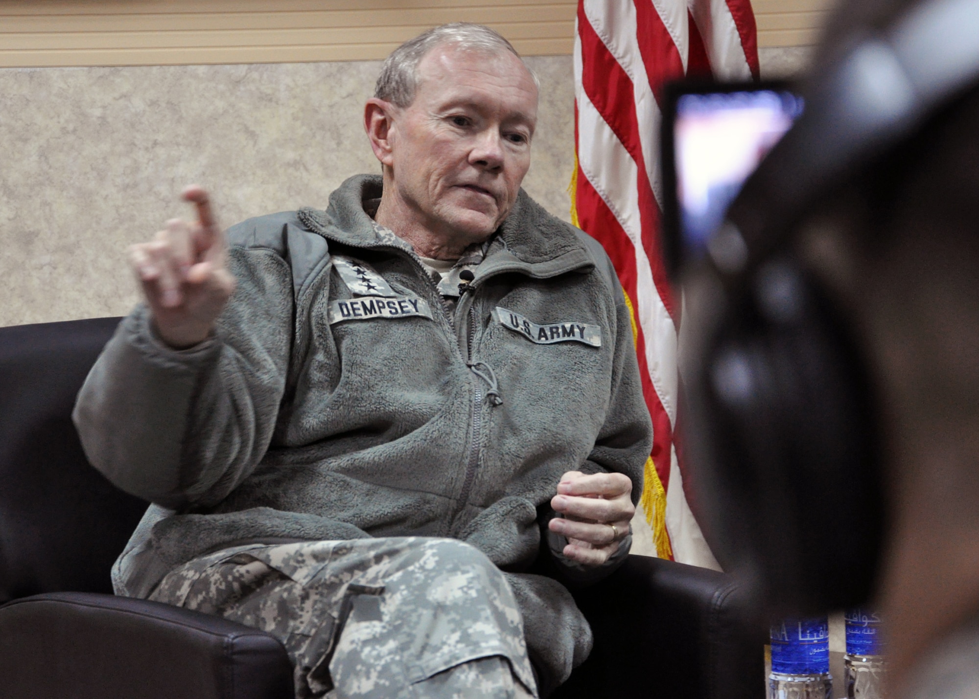 Army Gen. Martin Dempsey, Chairman of the Joint Chiefs of Staff, conducts an interview where he discussed his views on the final drawdown from the Iraqi theater.  “I unequivocally describe what we’ve done in Iraq over the last eight years as a success,” the chairman said.  “[This is] evidenced by our effort to unseat a regime that was tyrannical and disruptive to the region; to restore a sense of governance and representative government; and to build security forces that – when the time came – could account for their own stability.  That is my definition of success.” (U.S. Air Force photo/Tech. Sgt. Stacy Fowler)