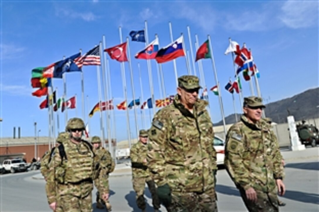 U.S. Army Chief of Staff Gen. Raymond T. Odierno, left, walks next to U.S. Army Lt. Gen. Curtis M. Scaparrotti, right, commander of the International Security Assistance Force Joint Command and deputy commander of U.S. Forces Afghanistan, while visiting headquarters in Kabul, Afghanistan, Dec. 20, 2011. Odierno is visiting troops in Afghanistan for the holidays. 