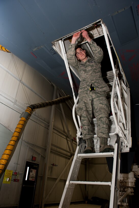 Airman 1st Class Anthony Soltesz, 28th Maintenance Squadron repair and reclamation journeyman, re-torques a bolt on the aircrew entry ladder of a B-1 bomber on Ellsworth Air Force Base, S.D., Dec. 22, 2011. Throughout the holiday season, the repair and reclamation Airmen, like numerous others around the base, worked 12-hour shifts to ensure the 28th Bomb Wing's fleet of B-1B aircraft are ready for any mission, anywhere in the world. (U.S. Air Force photo by Airman 1st Class Kate Thornton/Released)
