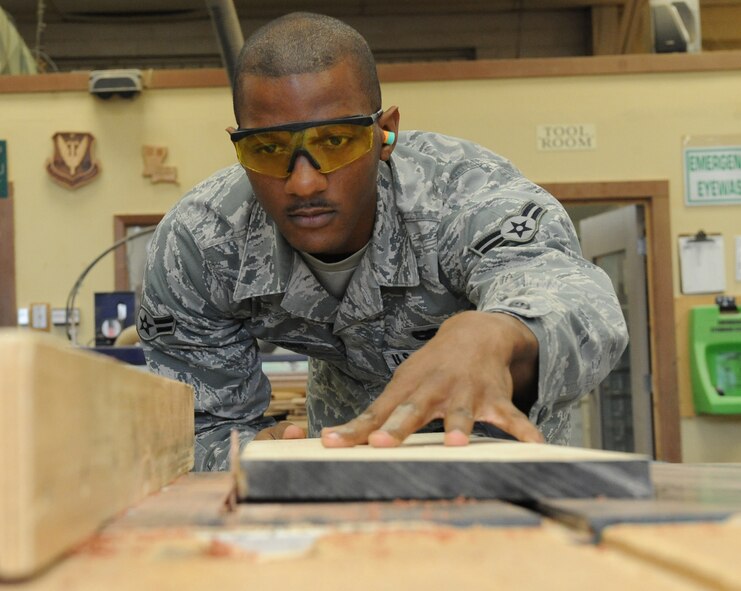 "The Wood Craft Center is in need of a larger workspace, new equipment, more storage and better ventilation," said Airman 1st Class Dominique Atkins, 2nd Logistics Readiness Squadron. "Barksdale produces several award winners, so the center generally produces most of the plaques and shadow boxes, and even the flag boxes given to retirees. Many may not actually go to the Wood Craft Shop and enjoy the ability to create and design things out of wood, but several military, retiree and dependant members at some point in time will need the staff of the Wood Craft Center to create a last minute project. The amount of work that comes through the wood center is a great work load for the three members but with better spacing, storage, and equipment we can continue to make fine works of art that we can all enjoy." (U.S. Air Force photo/Airman 1st Class Micaiah Anthony)(RELEASED) 