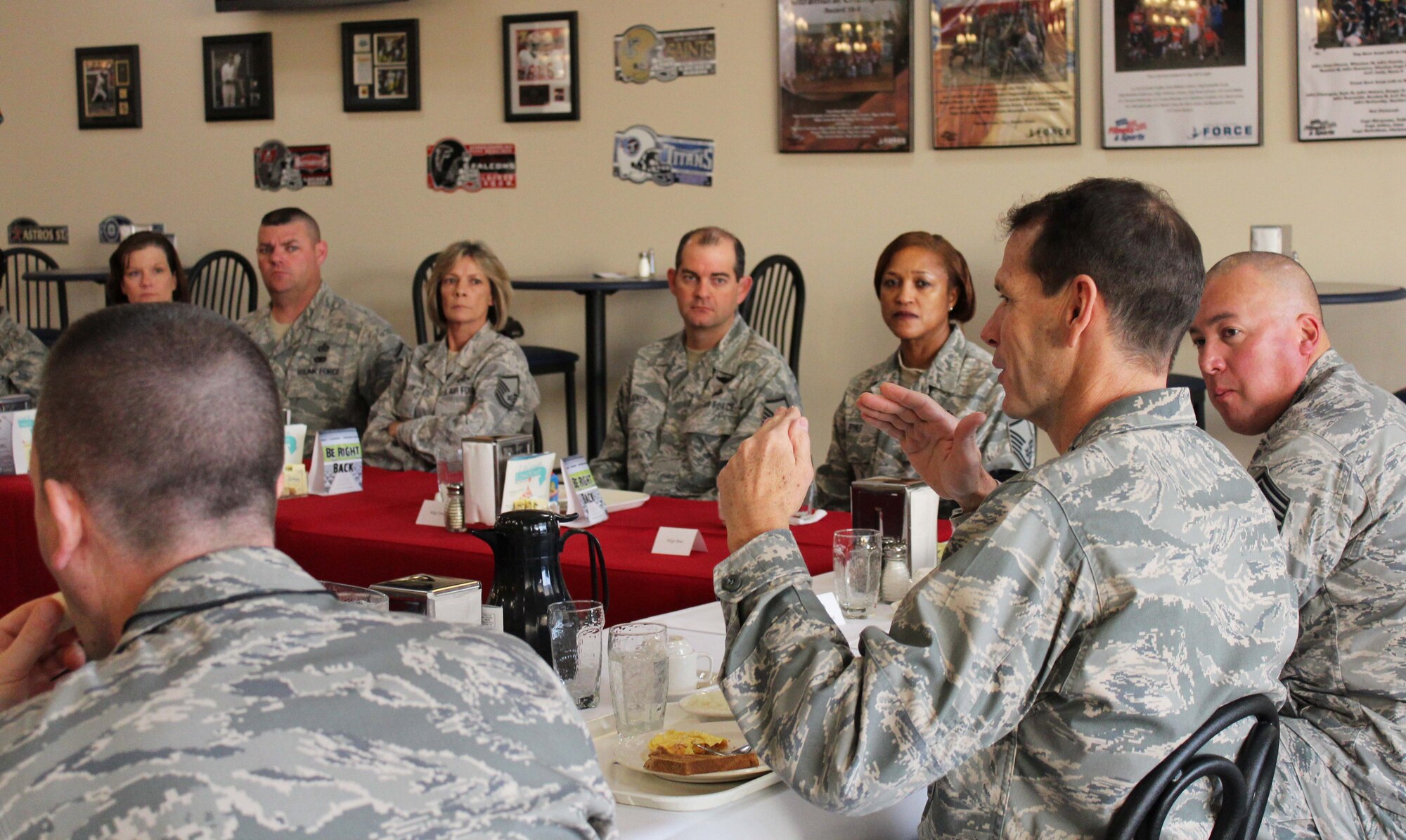 Senior noncommissioned officers from the Continental U.S. North American Aerospace Defense Command Region-1st Air Force (Air Forces Northern) listen as their commander Lt. Gen. Sid Clarke speaks at the dining facility on Tyndall Air Force Base, Fla., Dec. 22. Clarke sat down for breakfast with more than 20 of the command's senior NCOs to talk about issues that affect them, such as the budget, exercises, leadership and the wingman culture. (U.S. Air Force photo by Angela Pope) 