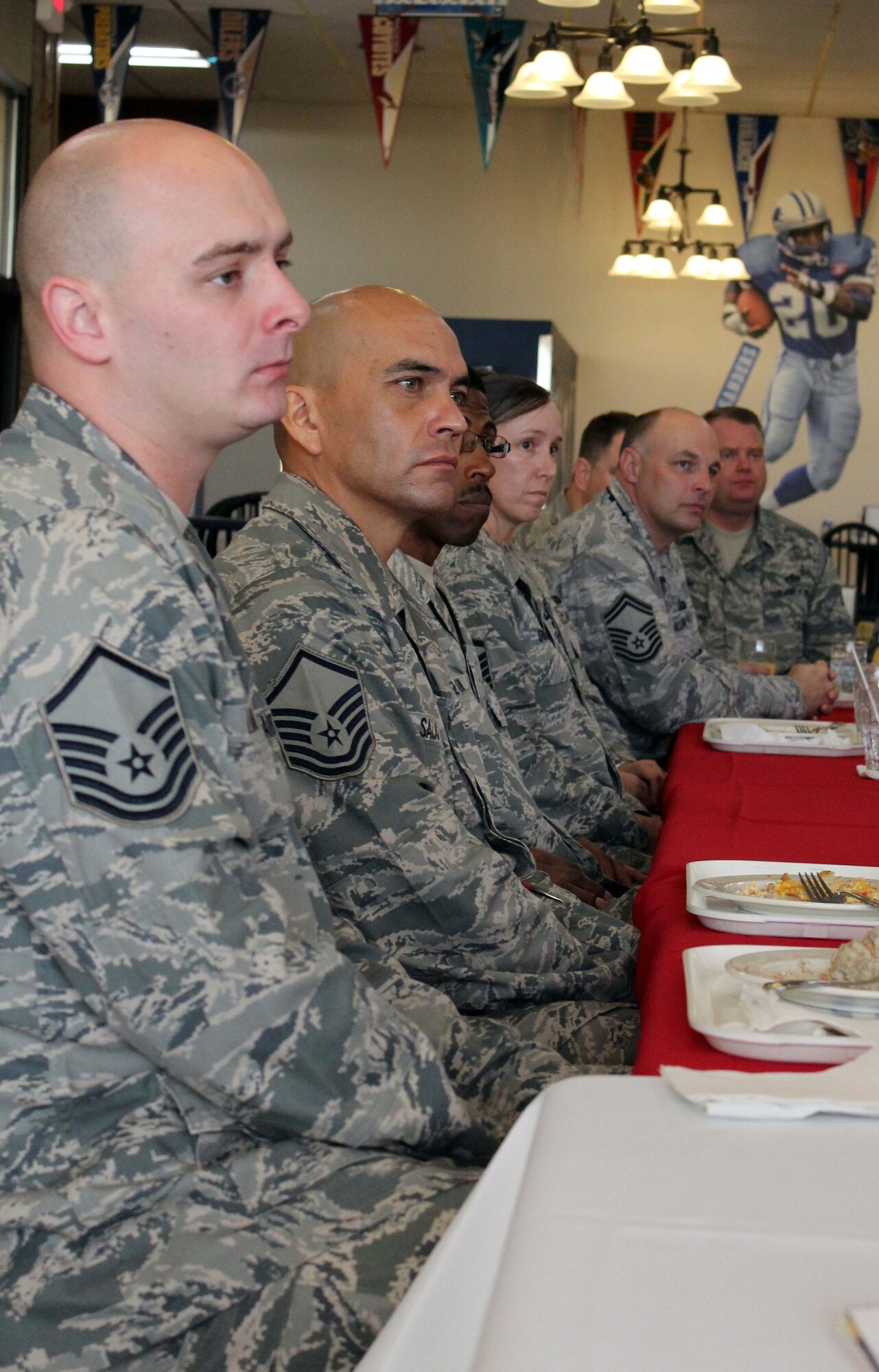 Senior noncommissioned officers from the Continental U.S. North American Aerospace Defense Command Region-1st Air Force (Air Forces Northern) listen as their commander Lt. Gen. Sid Clarke speaks at the dining facility on Tyndall Air Force Base, Fla., Dec. 22. Clarke sat down for breakfast with more than 20 of the command's senior NCOs to talk about issues that affect them, such as the budget, exercises, leadership and the wingman culture. (U.S. Air Force photo by Angela Pope) 