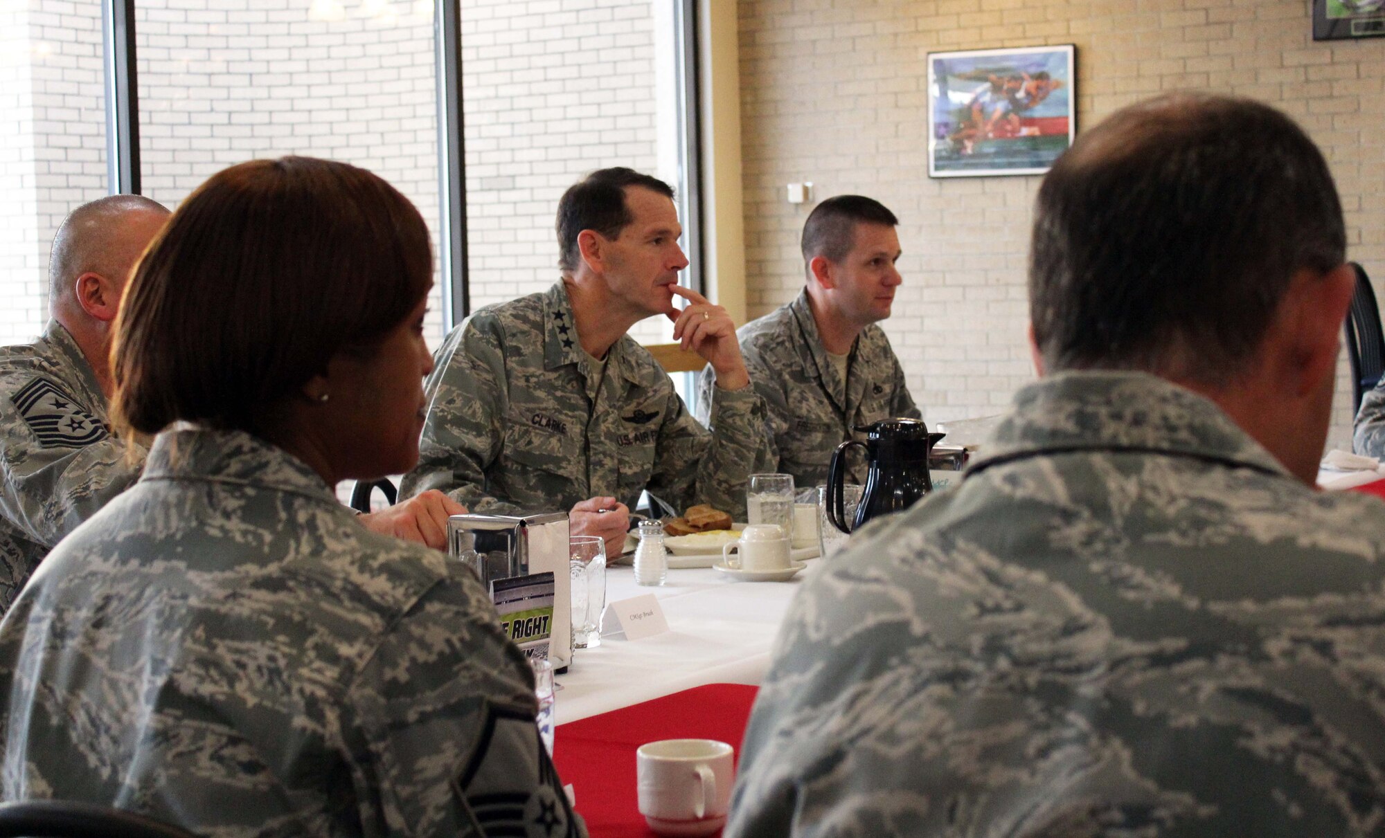 Lt. Gen. Sid Clarke, Continental U.S. North American Aerospace Defense Command Region-1st Air Force (Air Forces Northern) commander, takes a question from a senior noncommissioned officer at the dining facility on Tyndall Air Force Base, Fla., Dec. 22. Clarke sat down for breakfast with more than 20 of the command's senior NCOs to talk about issues that affect them, such as the budget, exercises, leadership and the wingman culture. (U.S. Air Force photo by Angela Pope) 