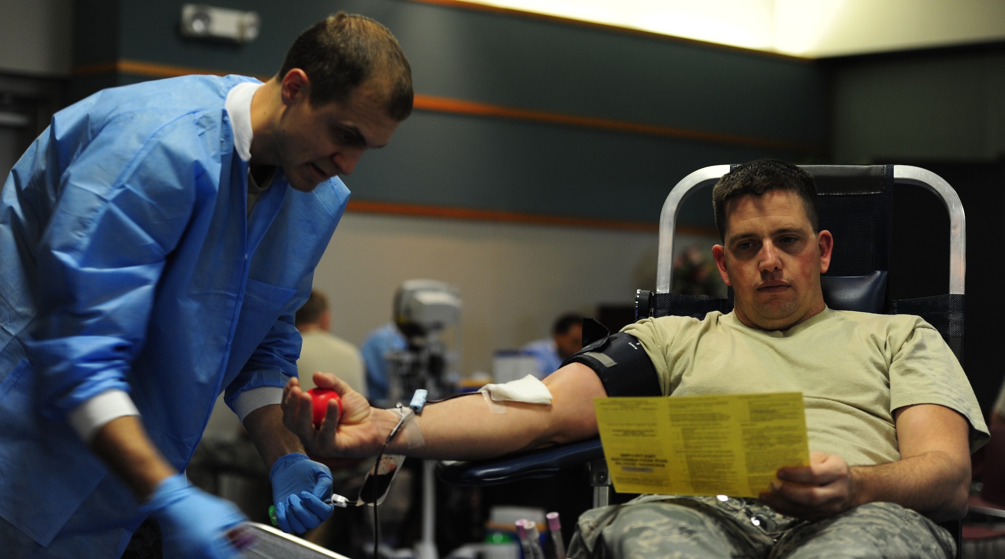WHITEMAN AIR FORCE BASE, Mo. -- Staff Sgt. Torrey Woodcock, Fort Leonard Wood Blood Donor Center medical laboratory technician, takes blood from Tech. Sgt. Travis Trudeau, 442nd Maintenance Squadron armament specialist, during a blood drive at the community activity center as part of the Armed Services Blood Program Dec. 21. The mission of the ASBP is provide quality blood services for servicemembers and their families in support of global medical readiness during peacetime, humanitarian, and contingency operations. Volunteers who donate blood can give a maximum of one pint every 56 days. (U.S. Air Force photo/Senior Airman Nick Wilson)