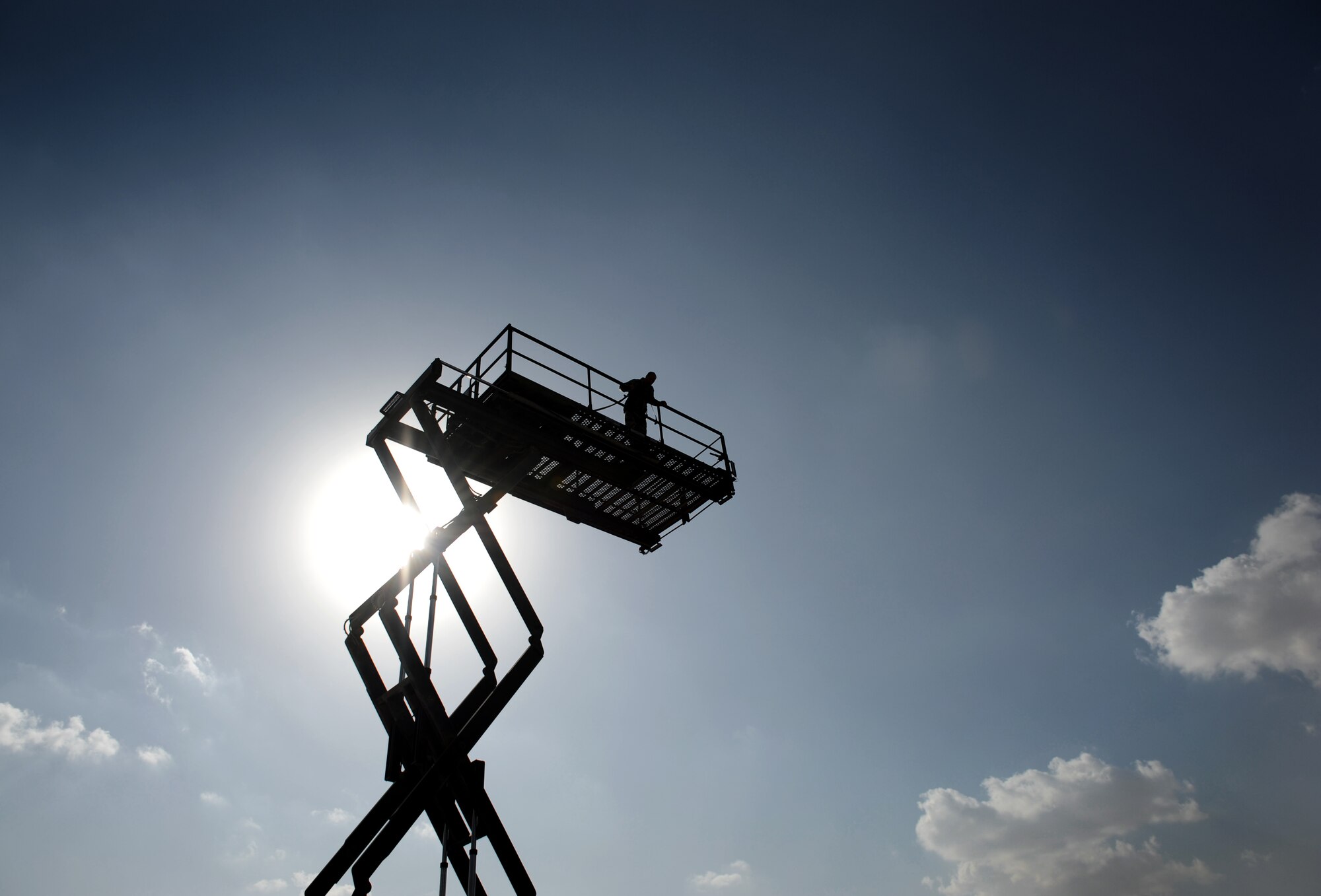 SOUTHWEST ASIA – Brig. Gen. Giovanni Tuck, 379th Air Expeditionary Wing commander, looks out over the 379th Expeditionary Maintenance Squadron Aerospace Ground Equipment Flight's compound here Dec. 21, 2011. The AGE flight maintains 638 pieces of equipment across the base. (U.S. Air Force photo/Staff Sgt. Nathanael Callon)