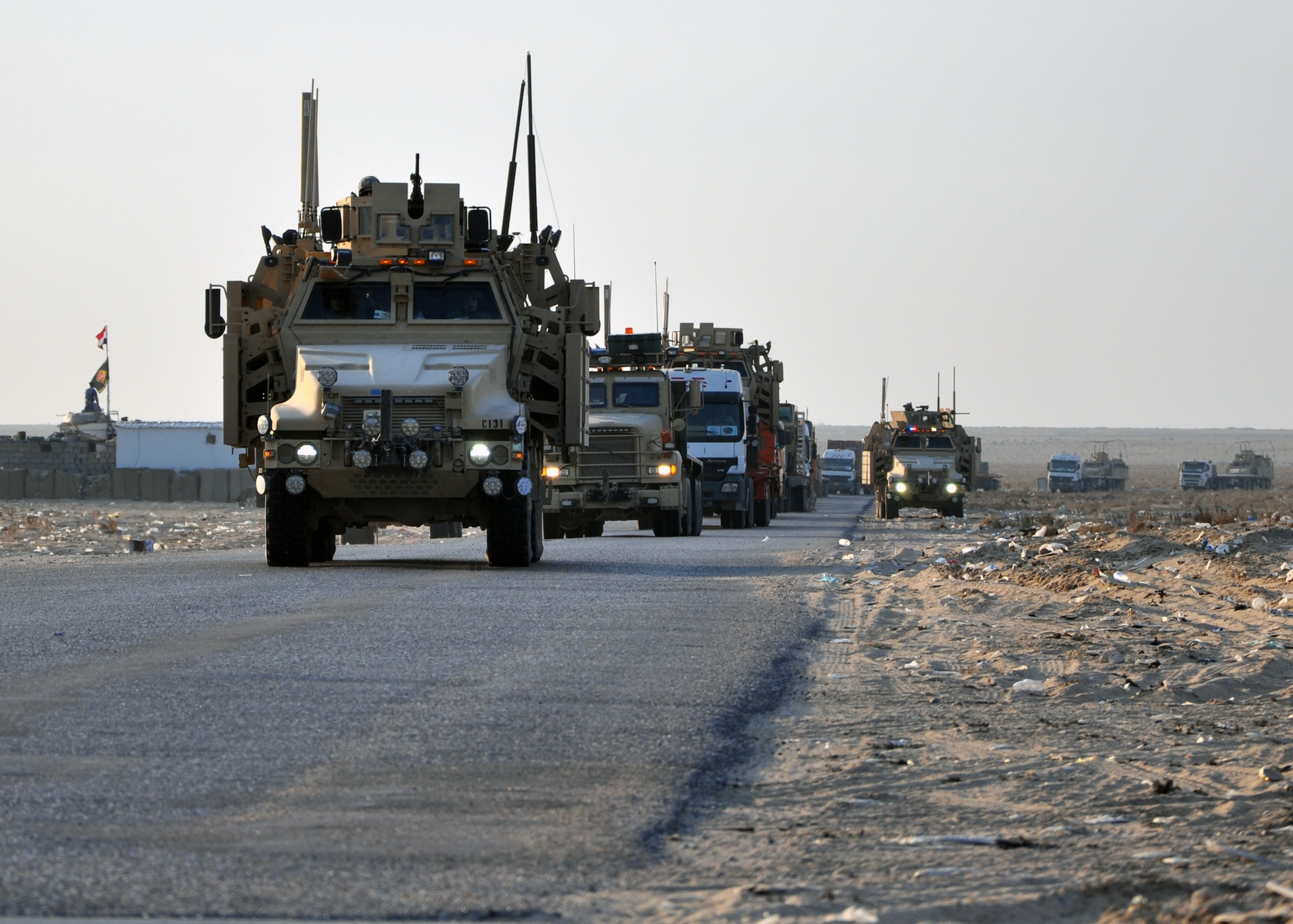 The last convoy of the 387th Expeditionary Logistics Readiness Squadron's "Convoy Truckers" leaves Iraq for the last time Dec. 17, 2011.  "We've done such a good job taking everything out in the past months, there wasn't really anything left to take on this last trip," said one Airman as they rallied up for the ride back to home base. (U.S. Air Force photo/Tech. Sgt. Stacy Fowler)