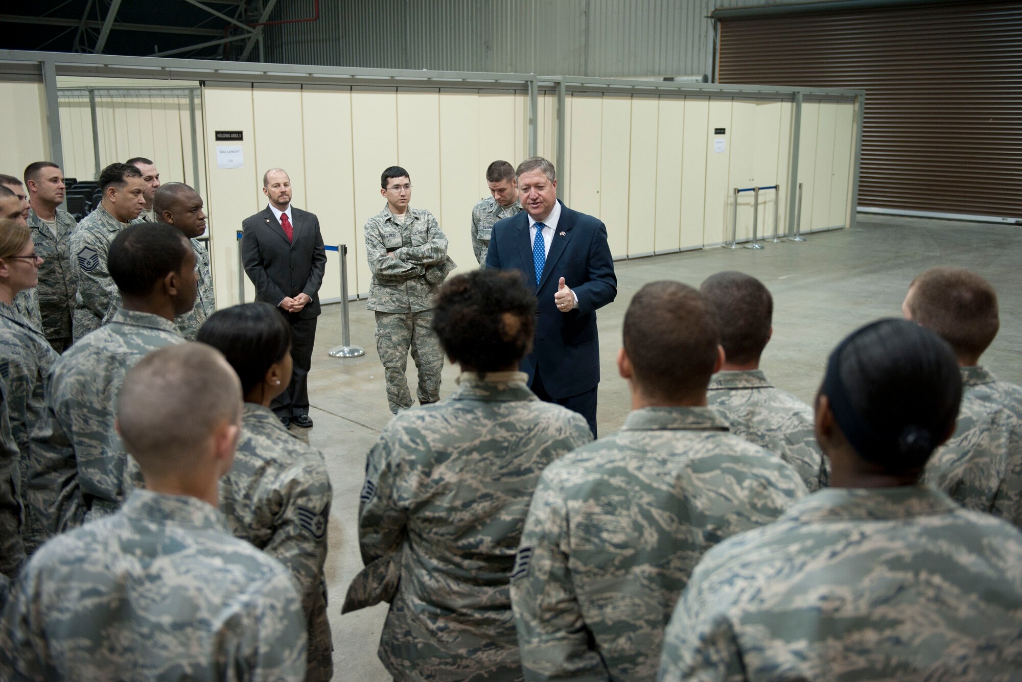Secretary of the Air Force Michael Donley speaks with Airmen from the 39th Logistics Readiness Squadron during a visit Dec. 20, 2011, at Incirlik Air Base, Turkey. During his visit, Donley met with Airmen across the base to personally thank them for their service. (U.S. Air Force photo by Senior Airman Clayton Lenhardt/Released)