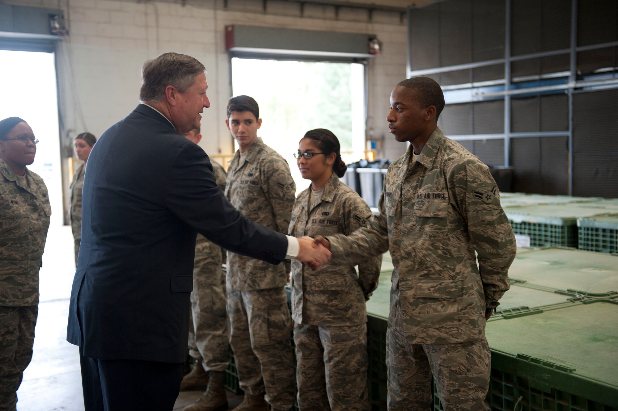 Airmen from the 39th Logistics Readiness Squadron greet Secretary of the Air Force Michael Donley during a visit Dec. 20, 2011, at Incirlik Air Base, Turkey. During his visit, Donley met with Airmen across the base to personally thank them for their service. (U.S. Air Force photo by Senior Airman Clayton Lenhardt/Released)