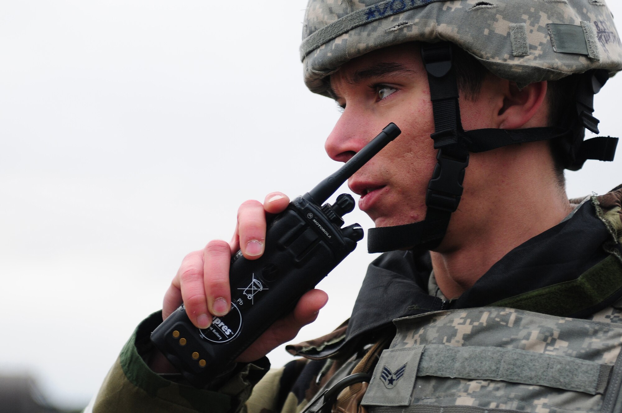 ROYAL AIR FORCE LAKENHEATH, England - Senior Airman Ivan Kalkbrenner, 48th Security Forces patrolman, reports mock unexploded ordinance during the NATO Tactical Evaluation, Dec. 15, 2011. The exercise measured the 48th Fighter Wing's ability to respond to a contingency situation. (U.S. Air Force photo by Senior Airman Lausanne Morgan)